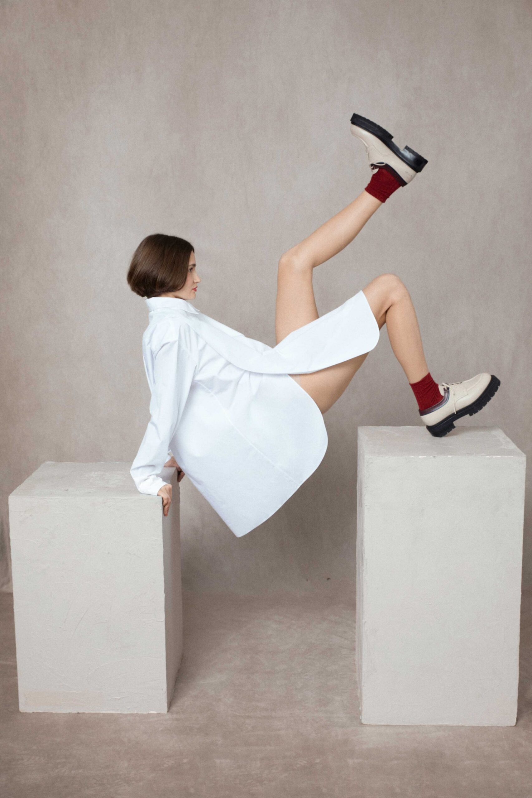 white cotton long-sleeve collared oversized short shirt