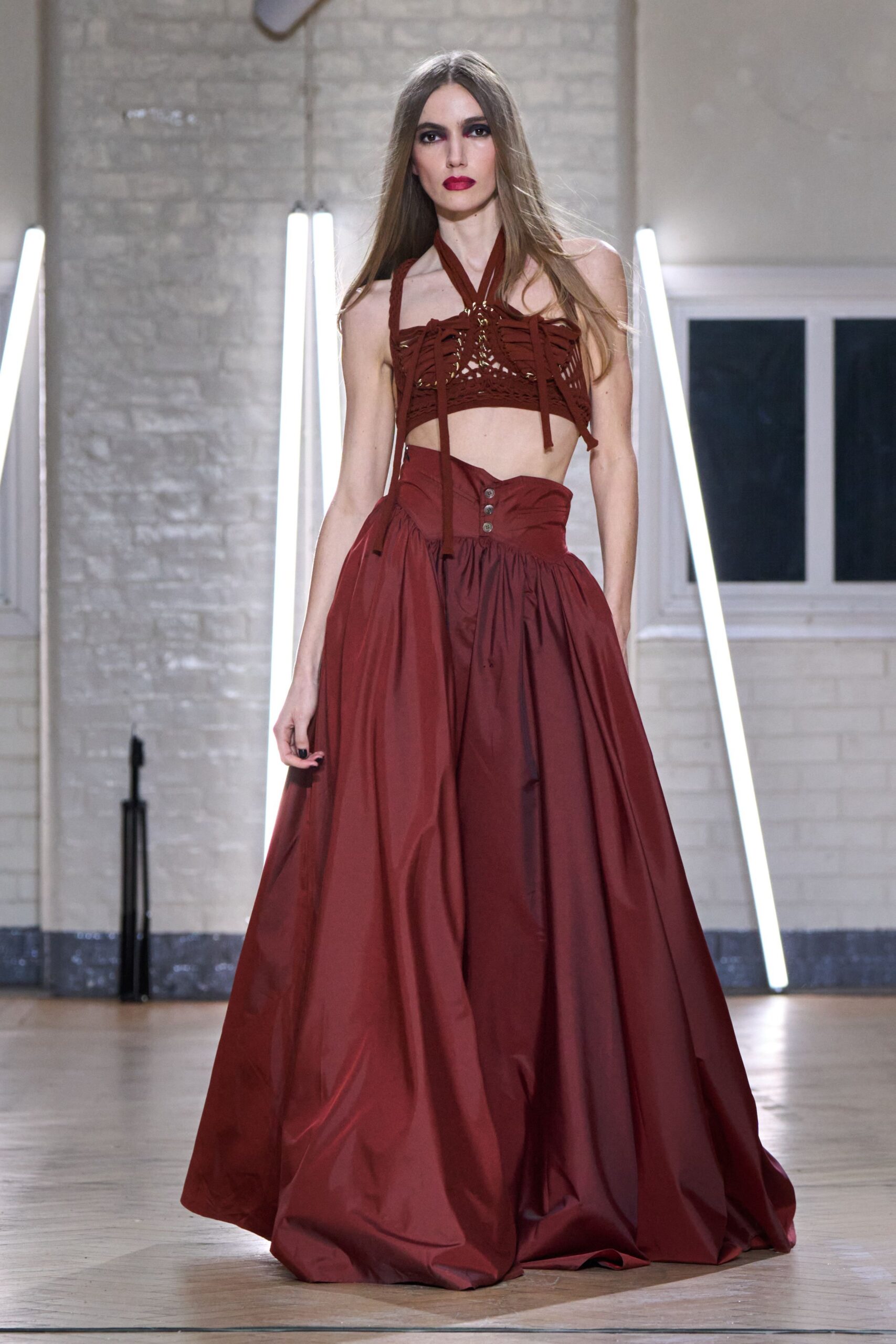 red halter top and pleated skirt