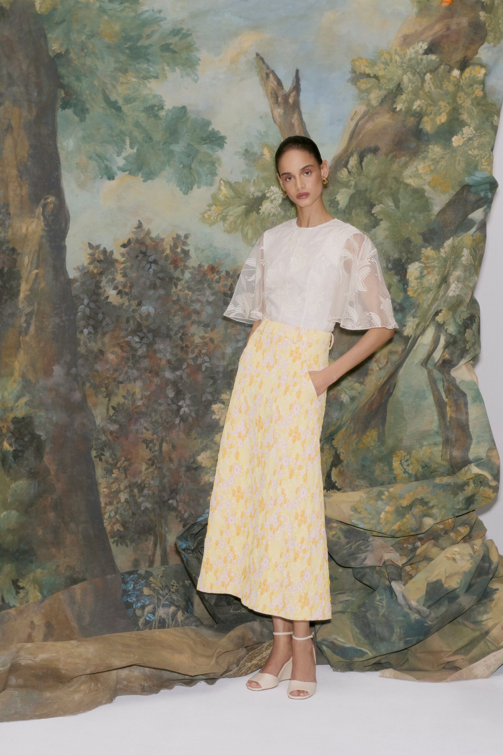 white embroidered top yellow midi skirt