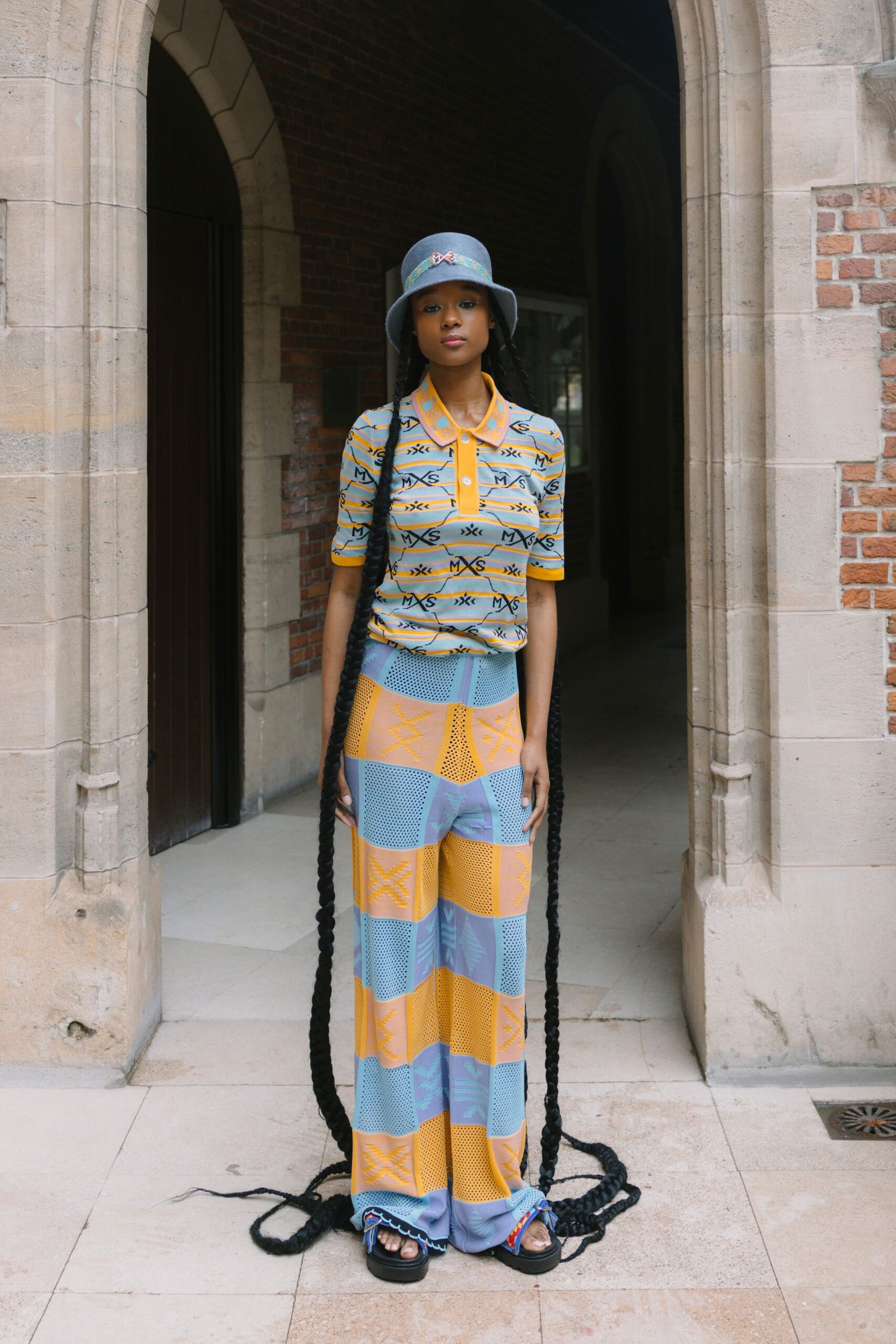 blue and yellow printed top with relaxed pants