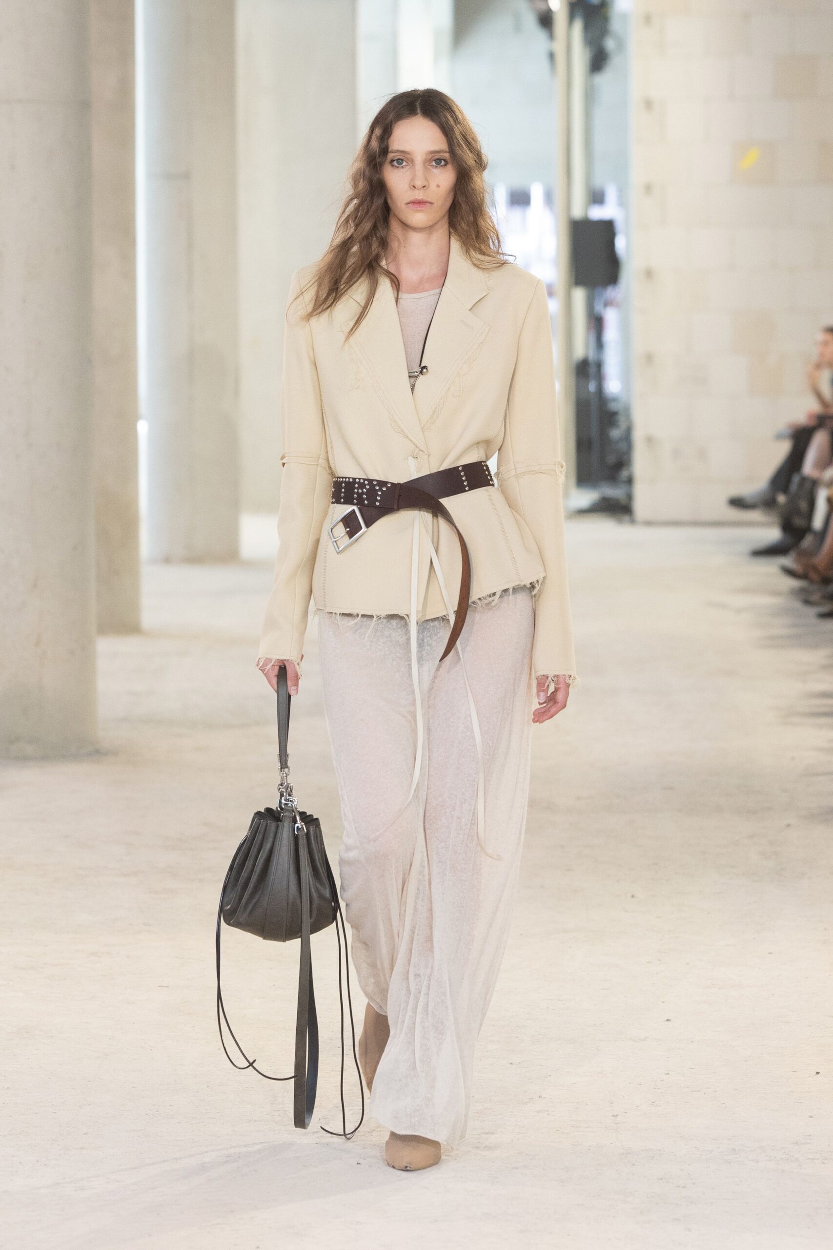beige tailored blazer and white maxi dress