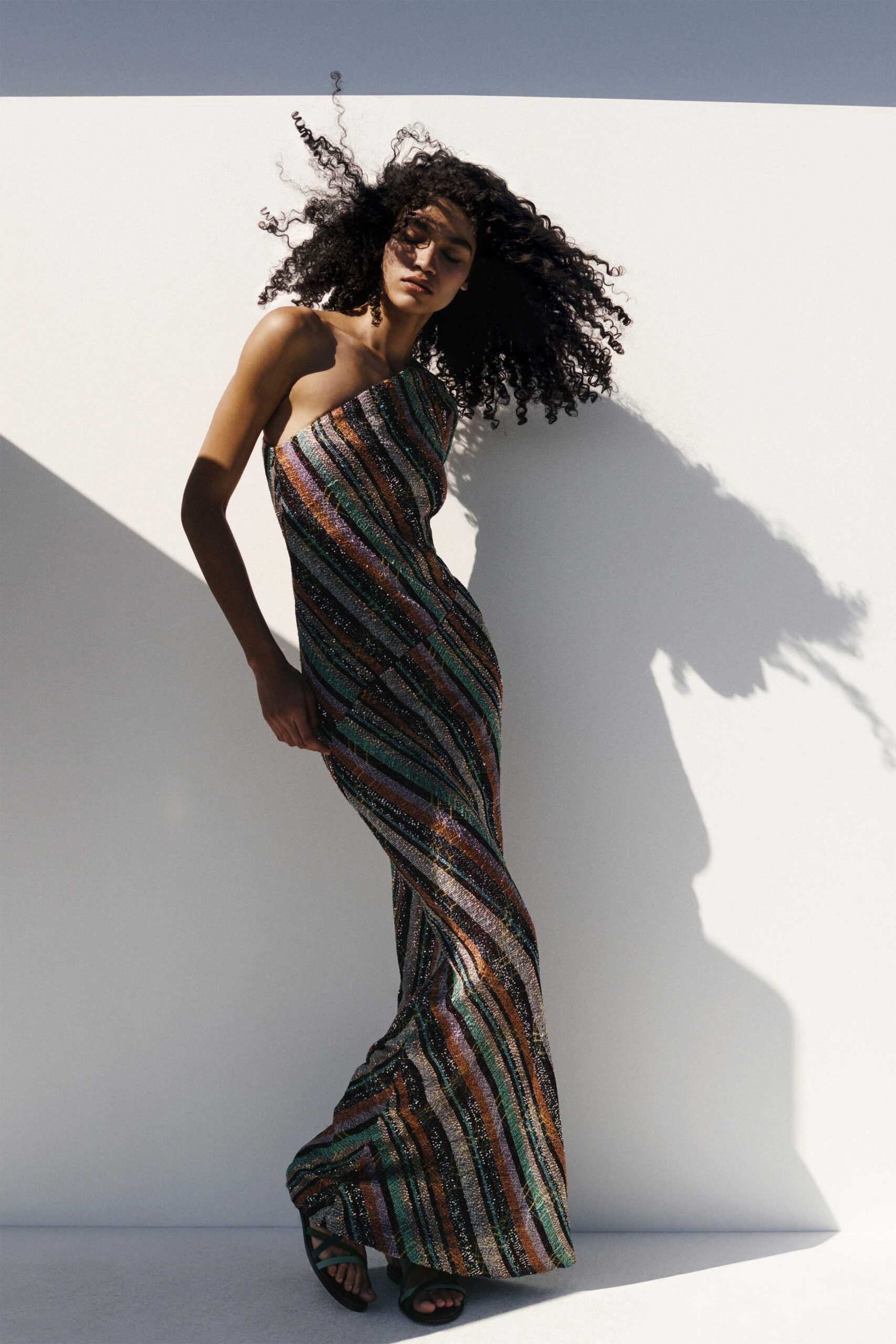 multi silk sleeveless off-shoulder fitted striped shiny gown