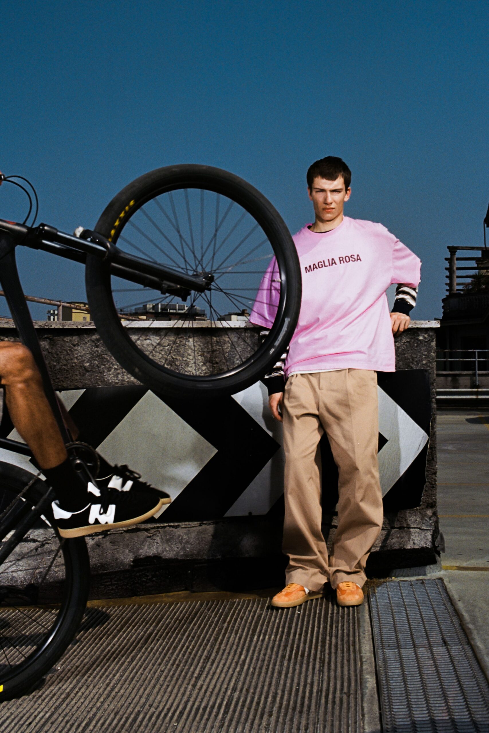 pink relaxed t-shirt with beige pants