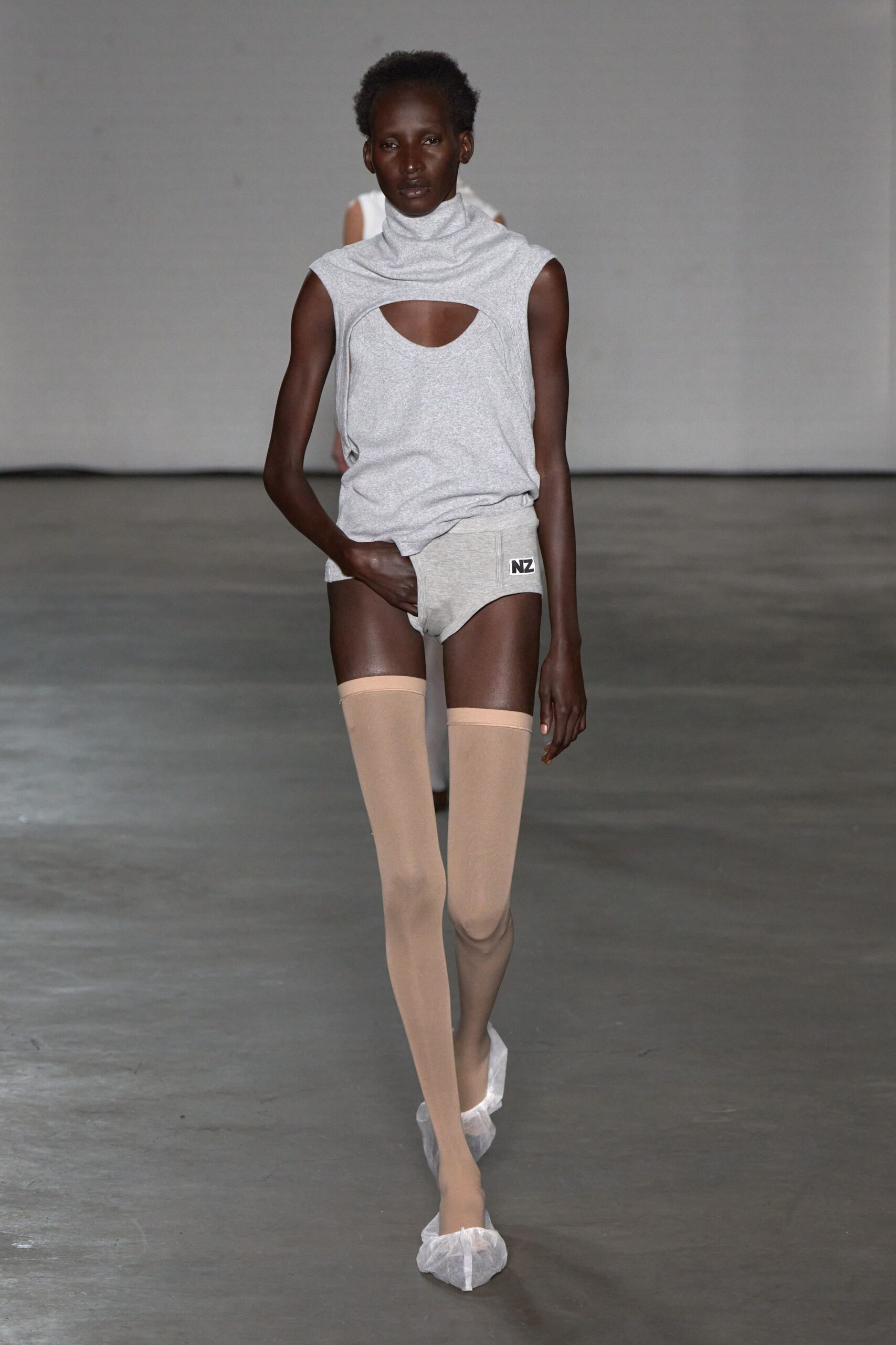 gray fitted top and shorts