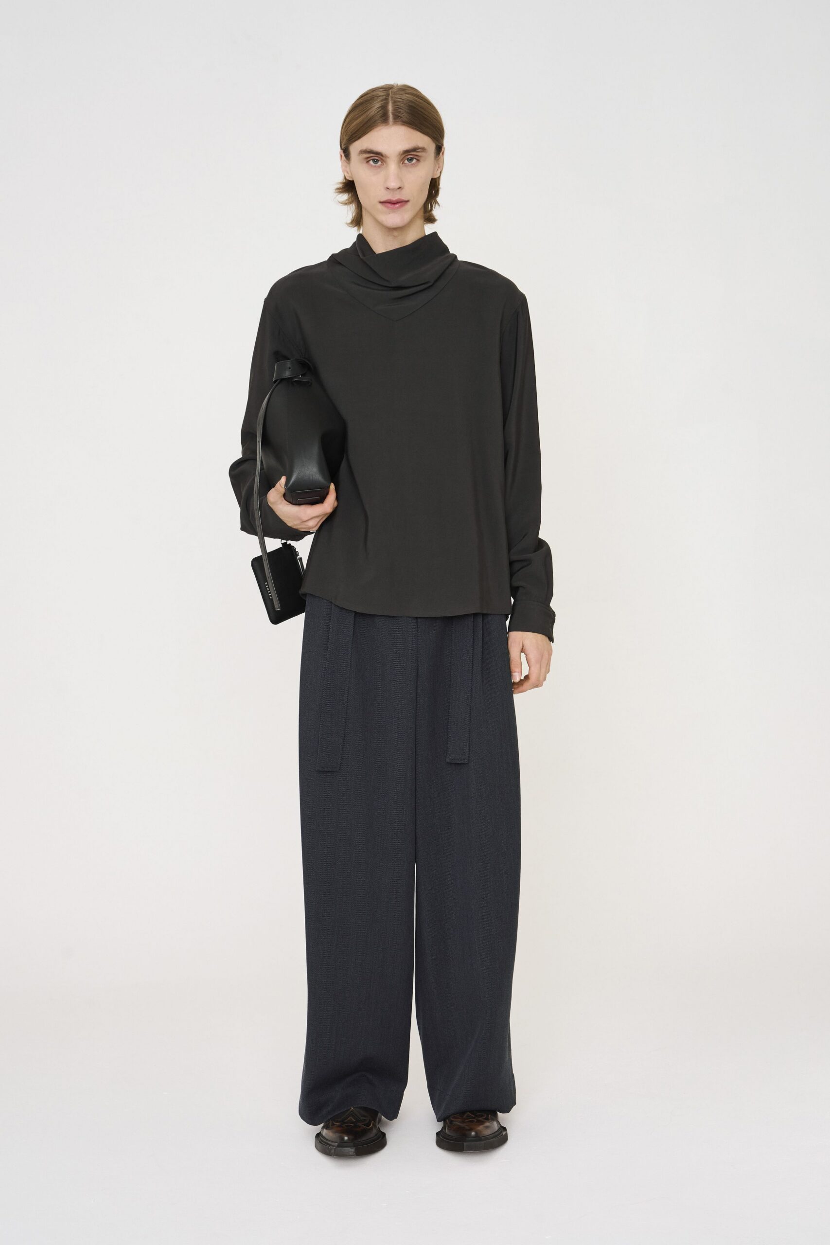 black relaxed top with gray wide-leg pants