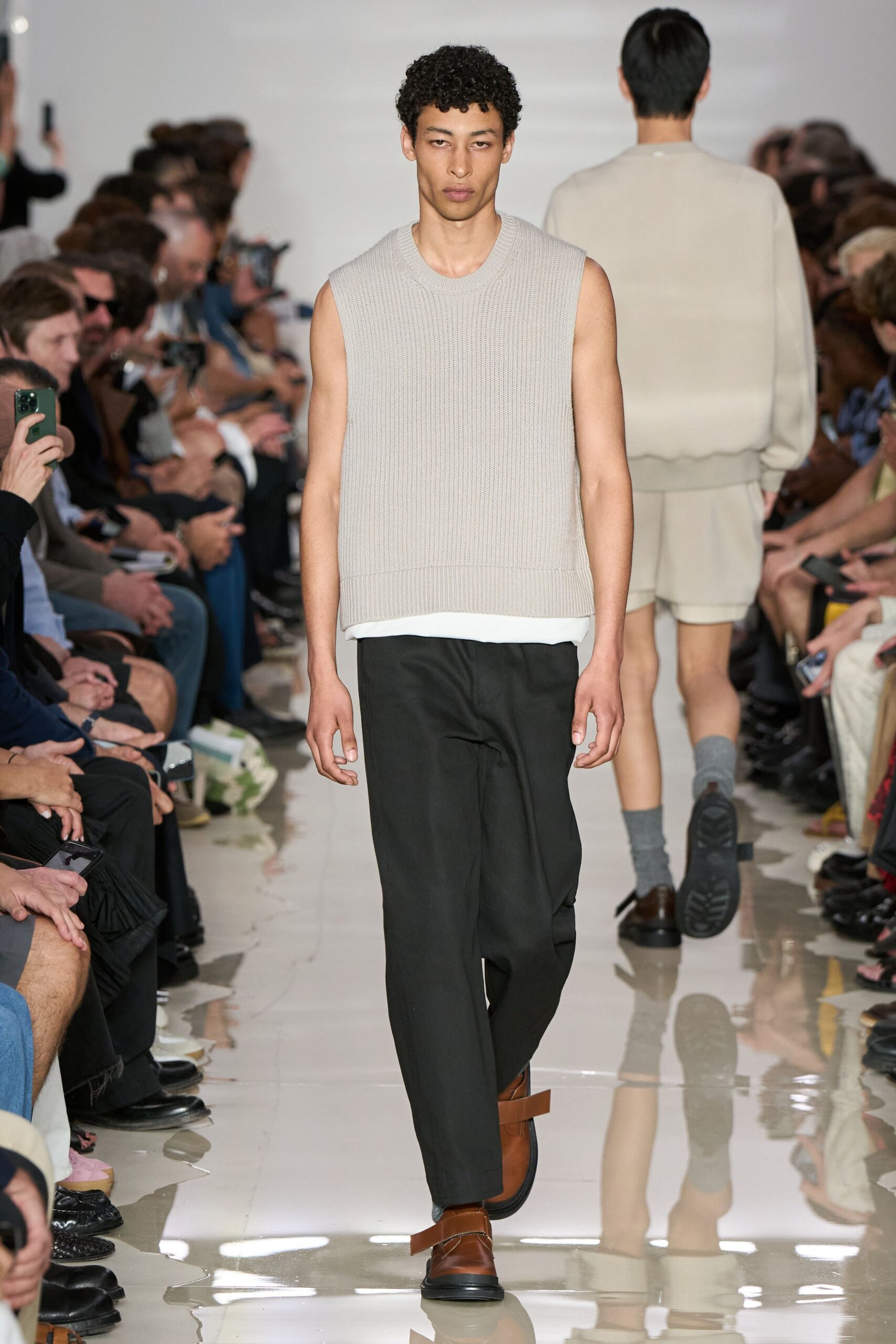 beige ribbed sleeveless top with black pants