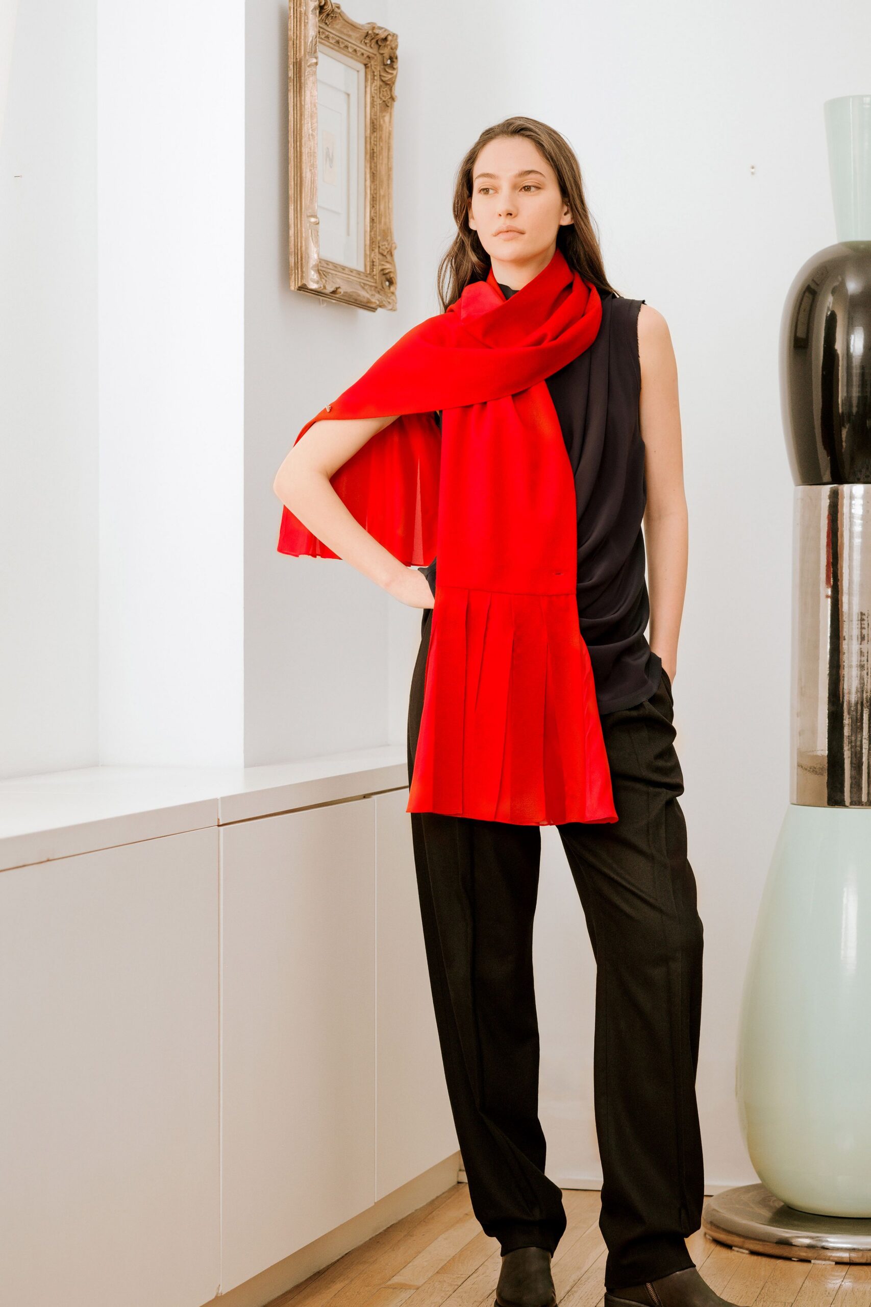 black relaxed top with red scarf