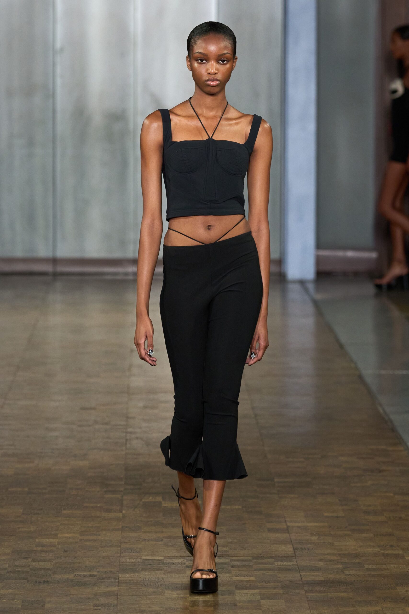 black crop-top and flared pants
