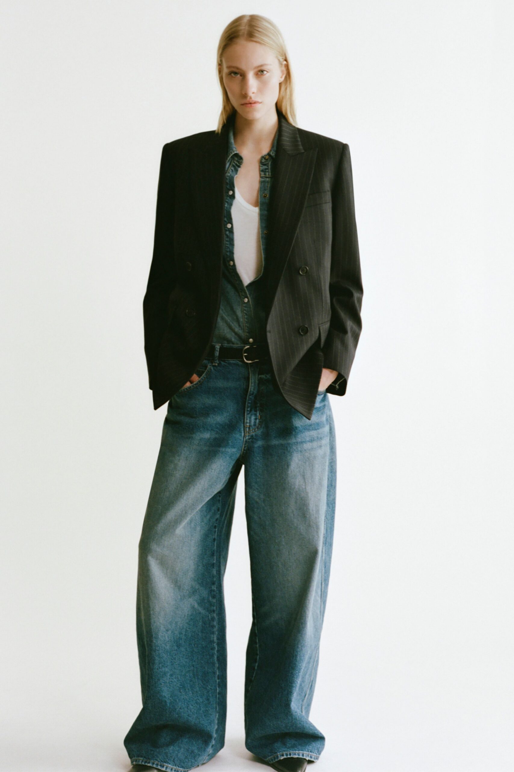 black blazer with wide-leg jeans