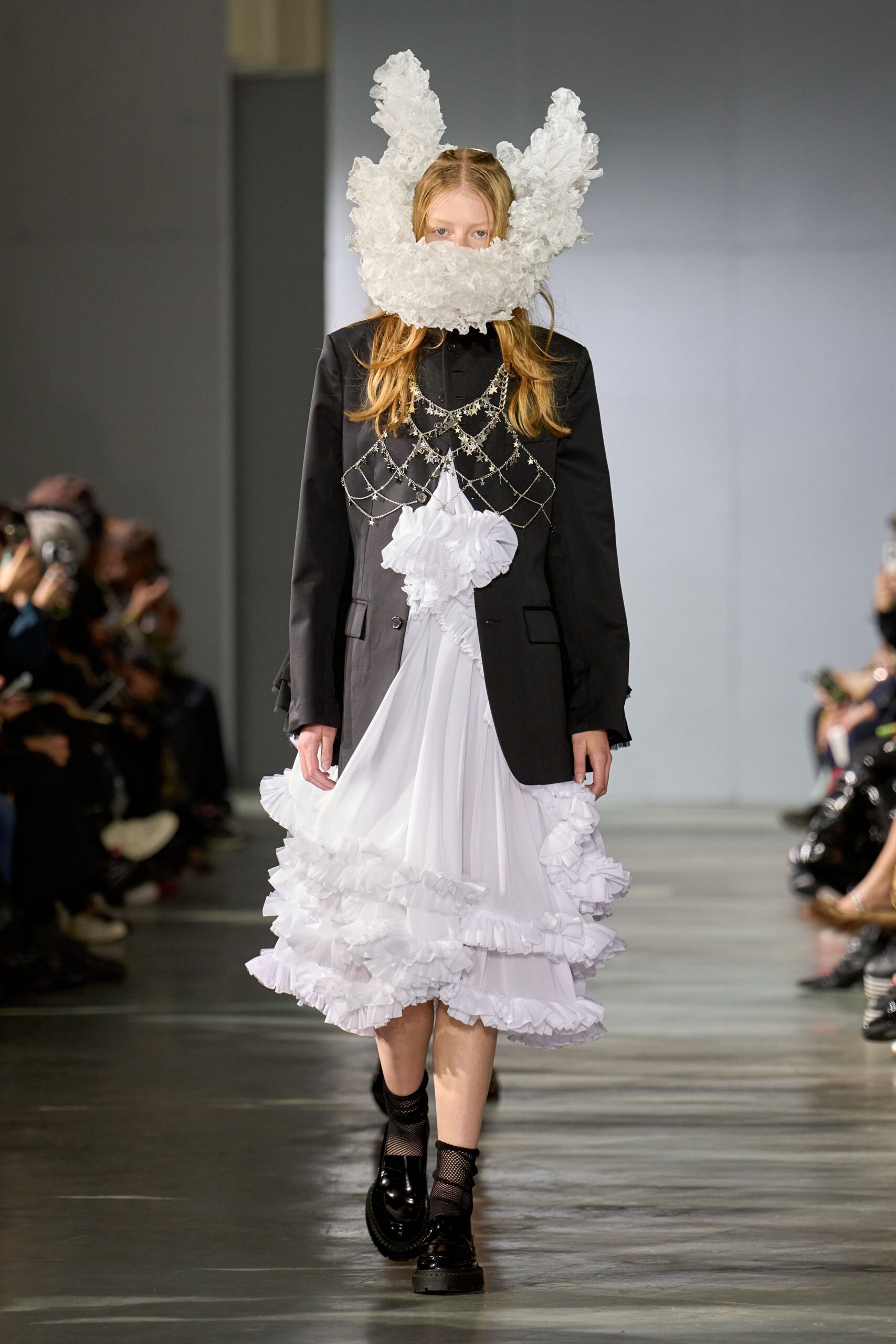 black blazer white ruffled dress
