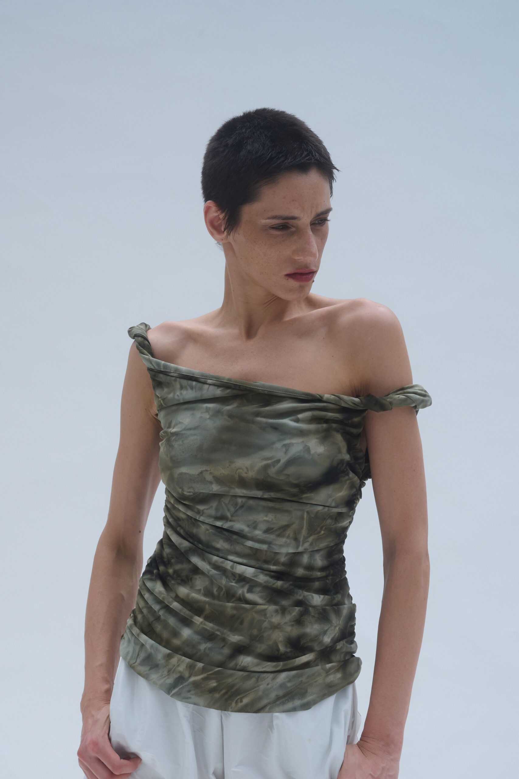 green silk sleeveless off-shoulder fitted ruched top