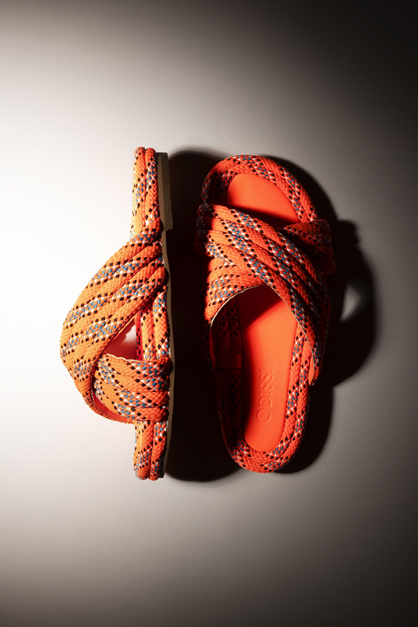 orange multi-colored woven sandals