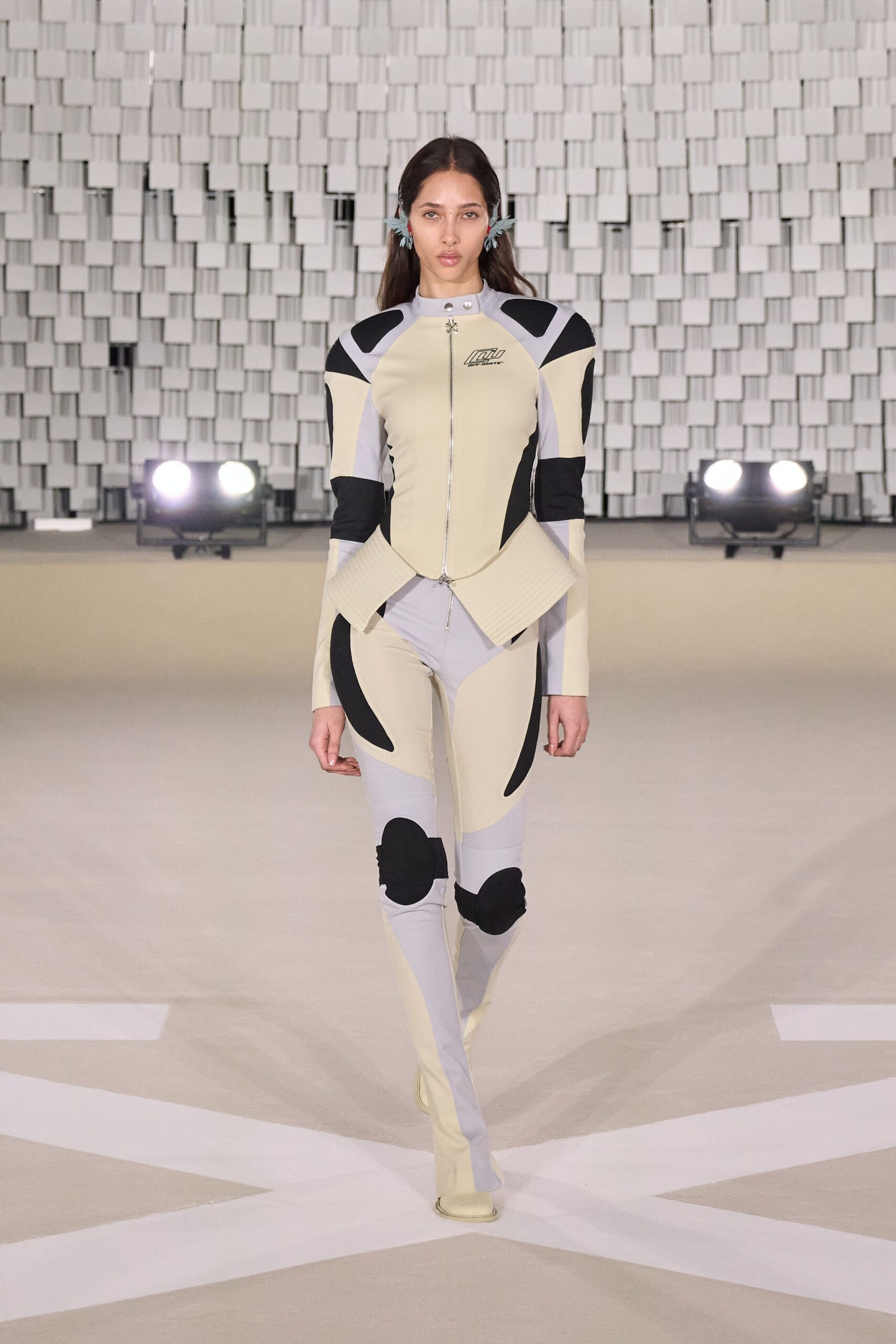 beige and black fitted catsuit