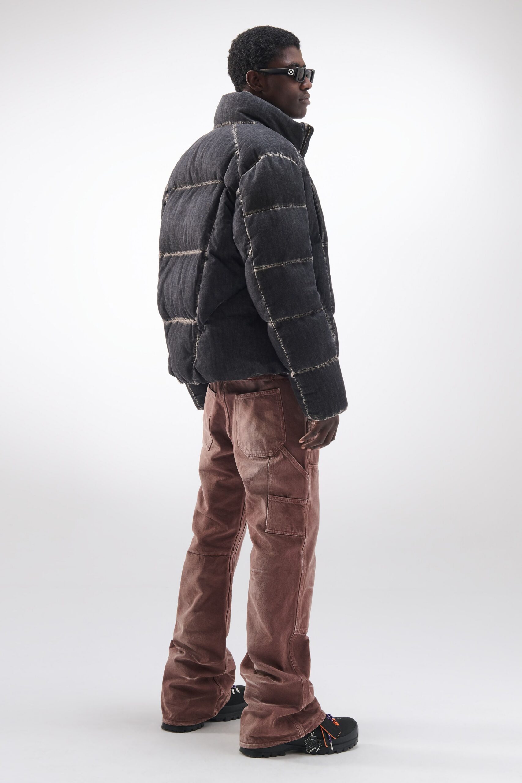 black padded jacket with cargo pants