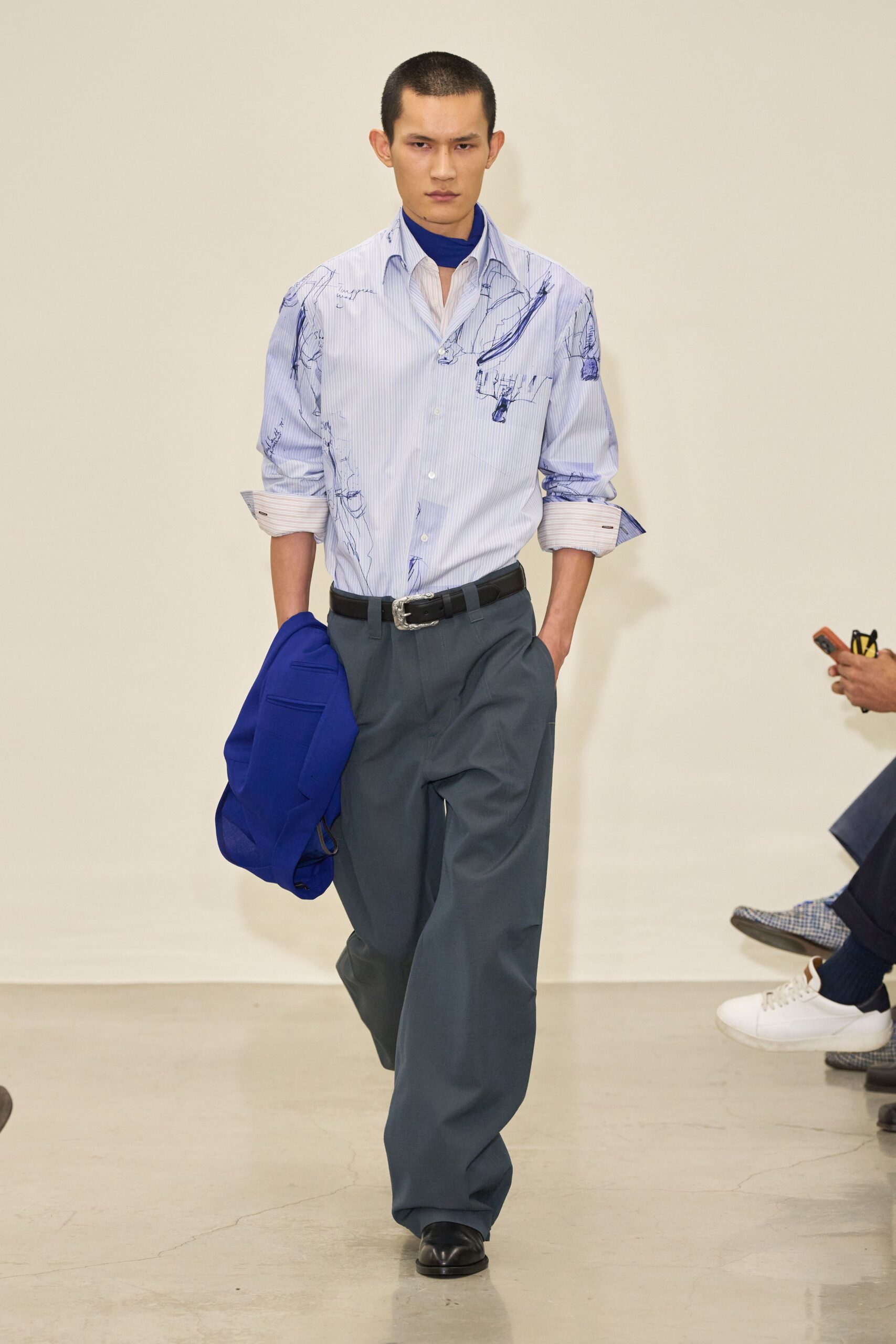 blue and white printed shirt with gray pants