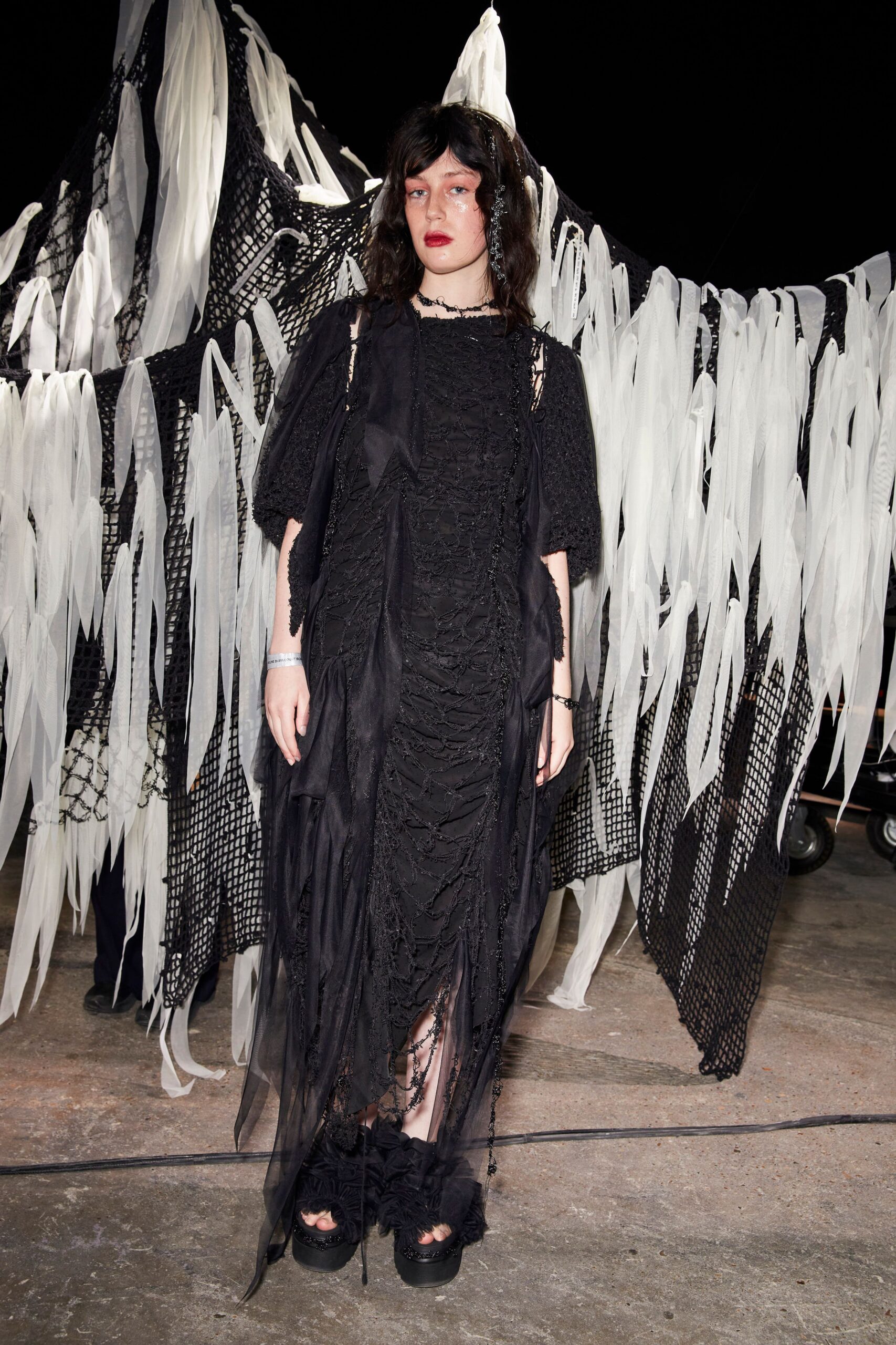 black midi dress with platform shoes