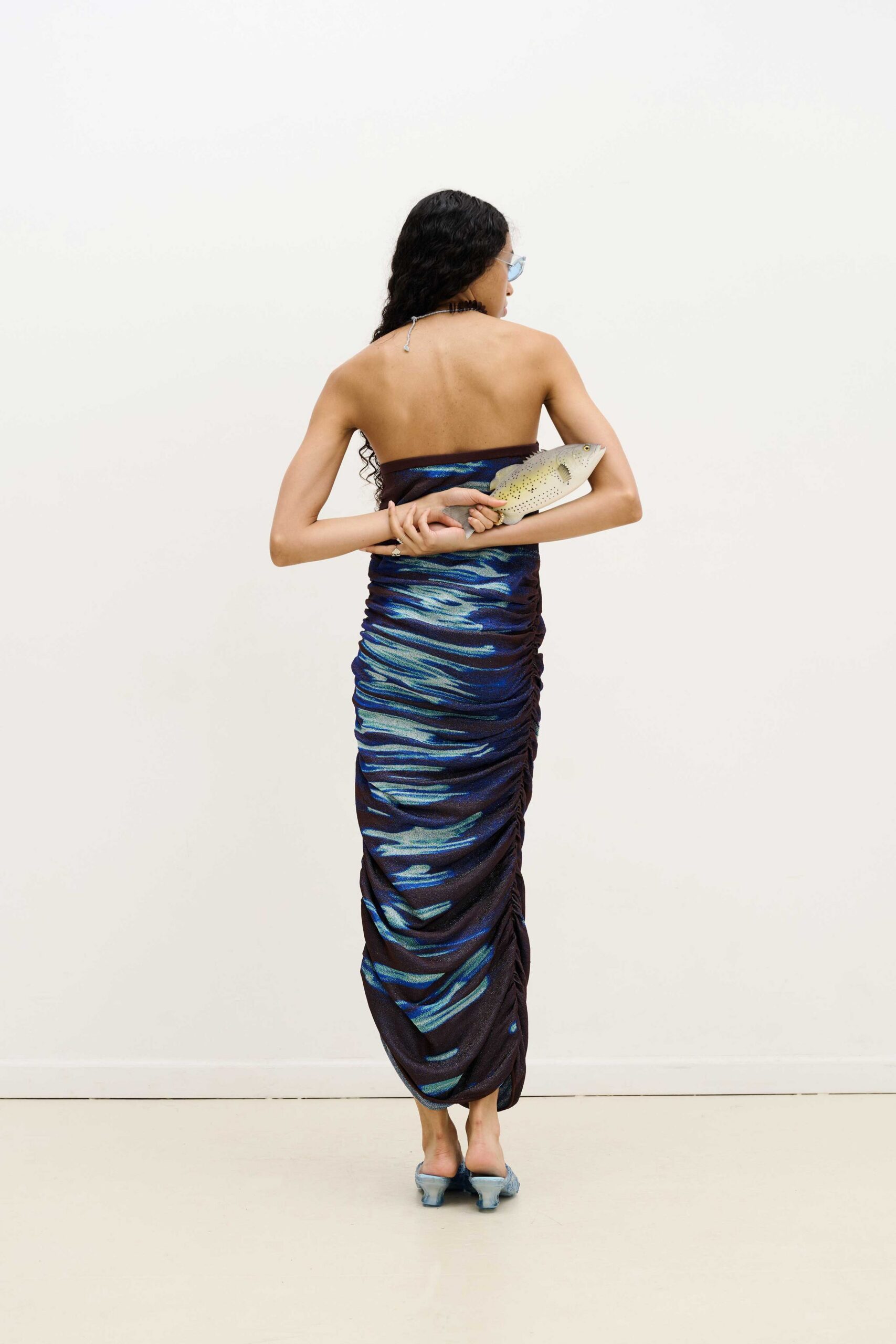 blue silk strapless fitted ruched flowing maxi gown