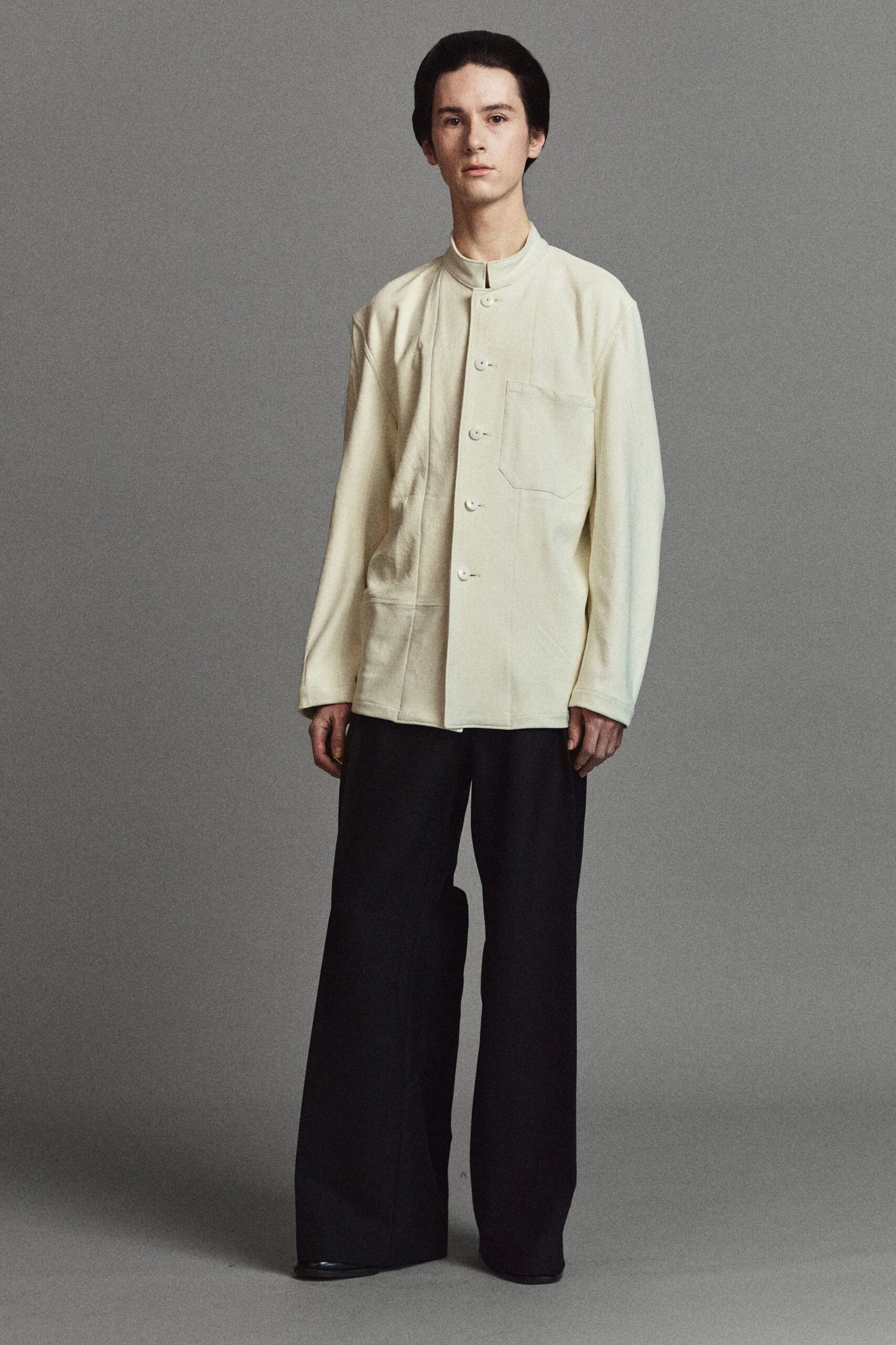 white relaxed shirt and black pants