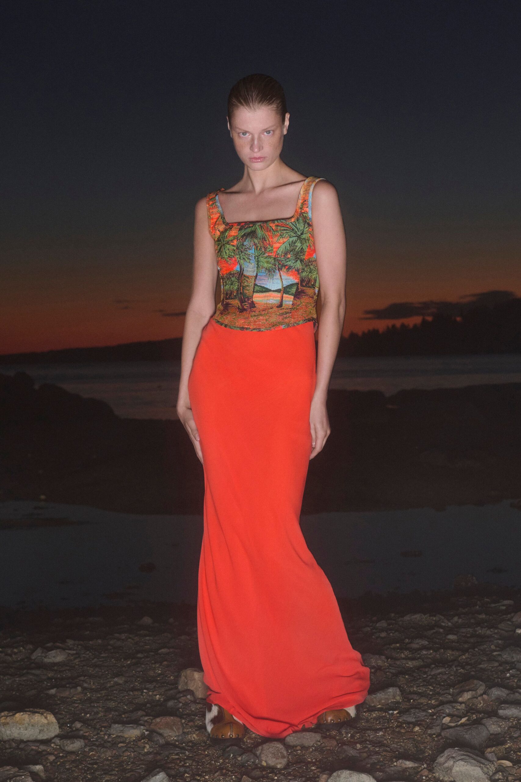 orange silk sleeveless square-neck fitted flared flowing gown