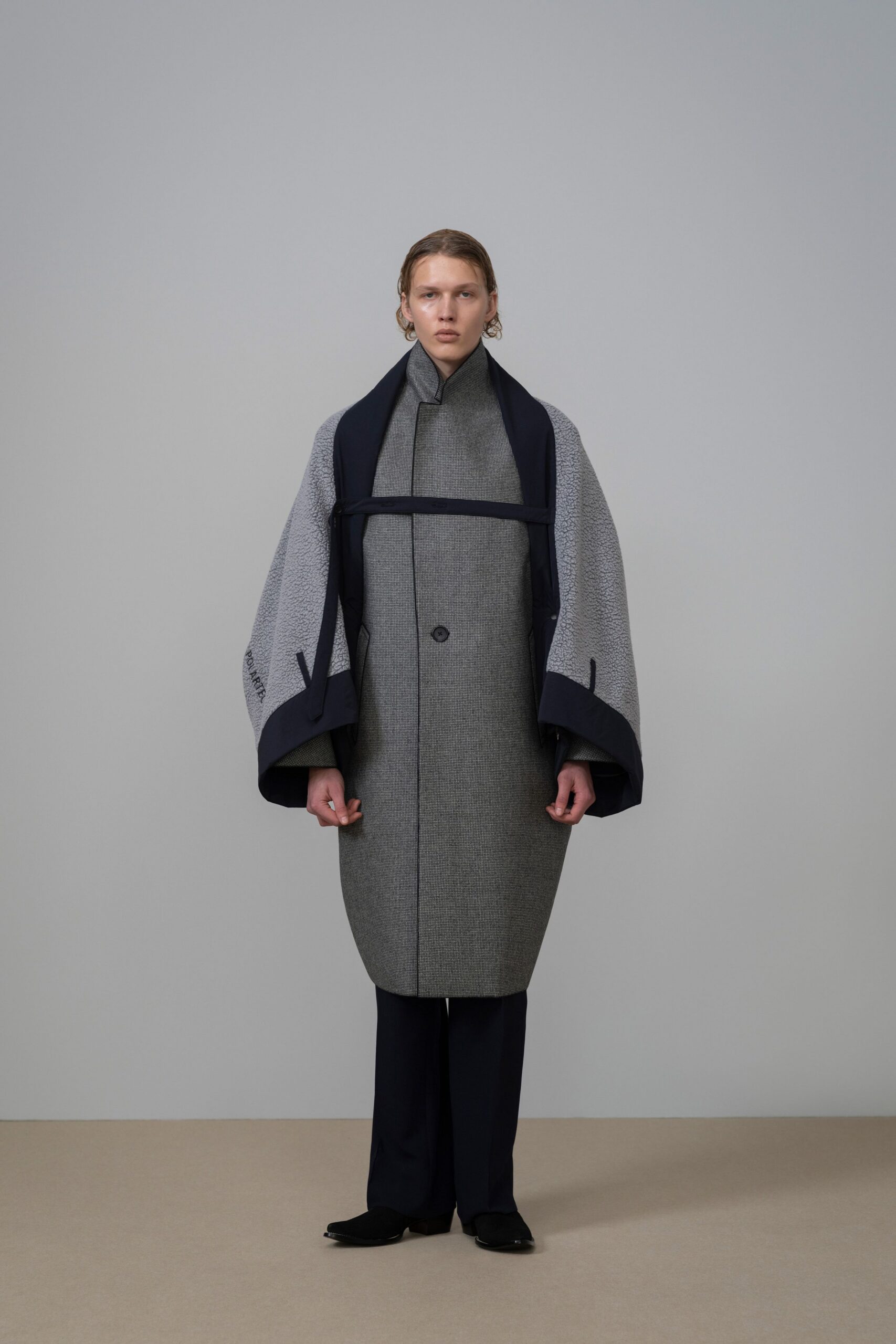 gray wool long-sleeve collared relaxed buttoned layered coat