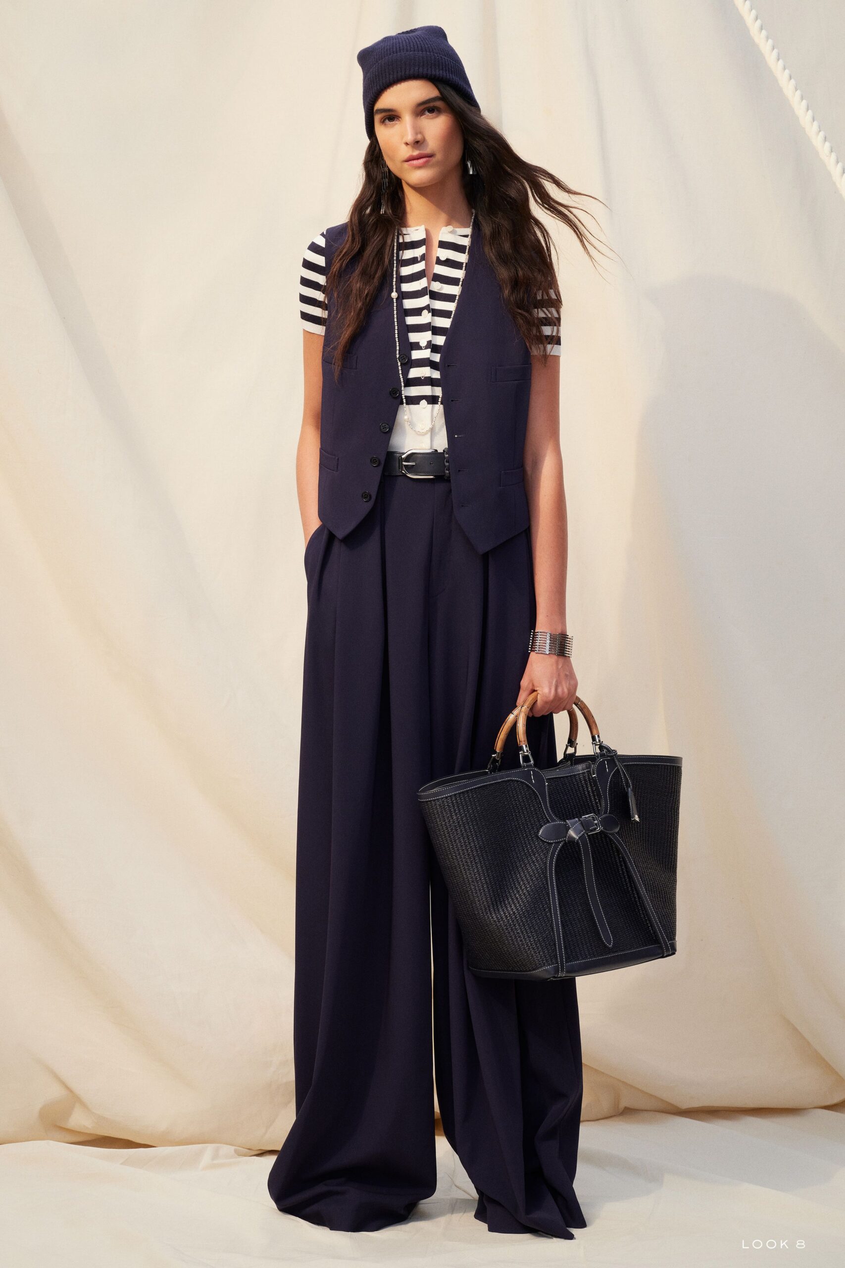 navy vest with striped t-shirt
