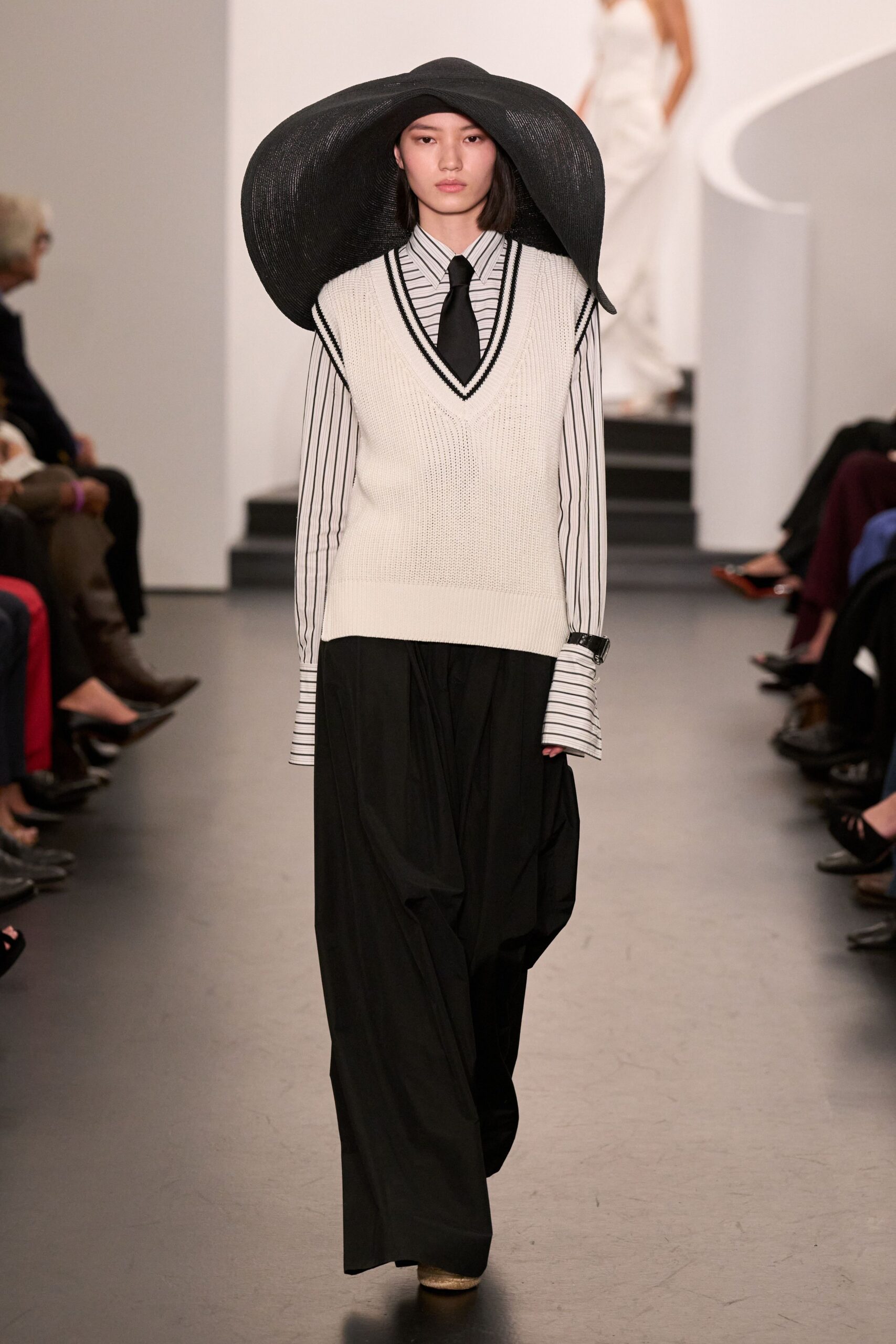 white vest black striped shirt