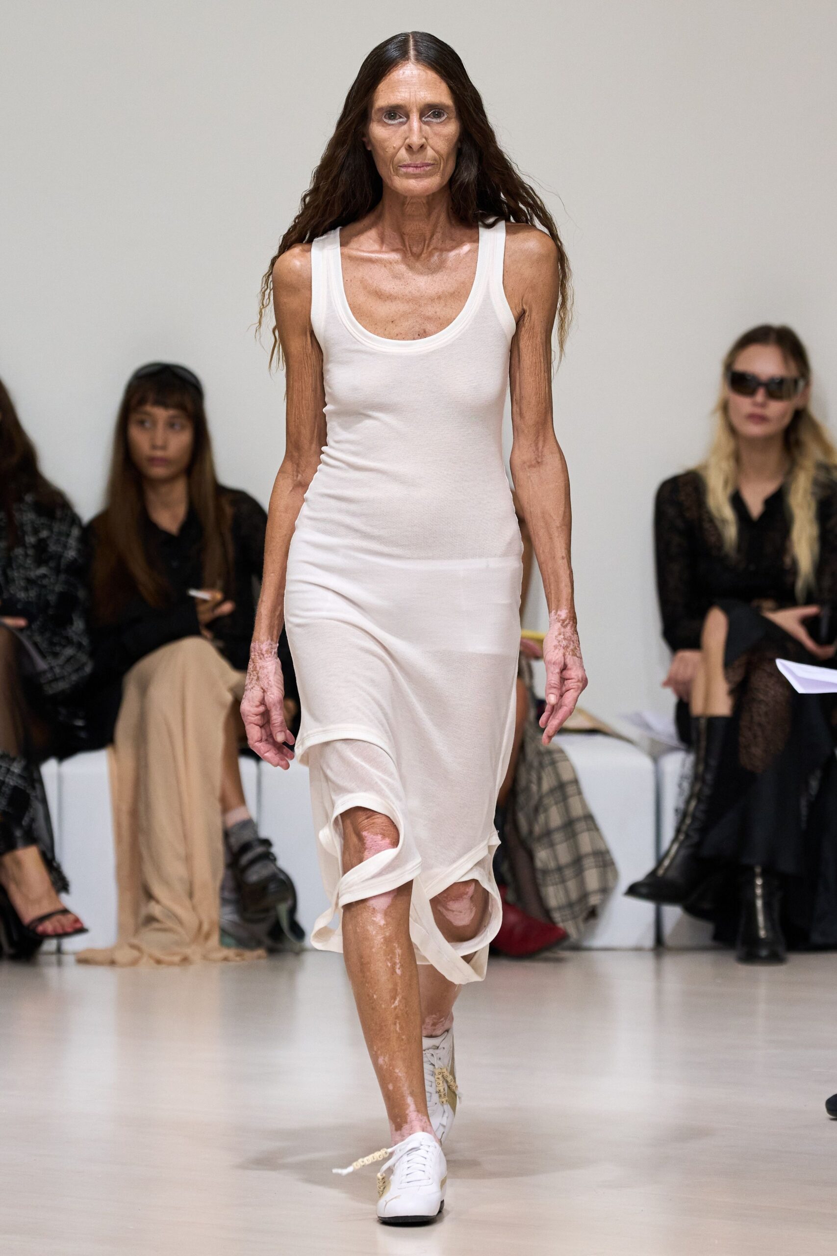 white fitted sleeveless dress with sneakers