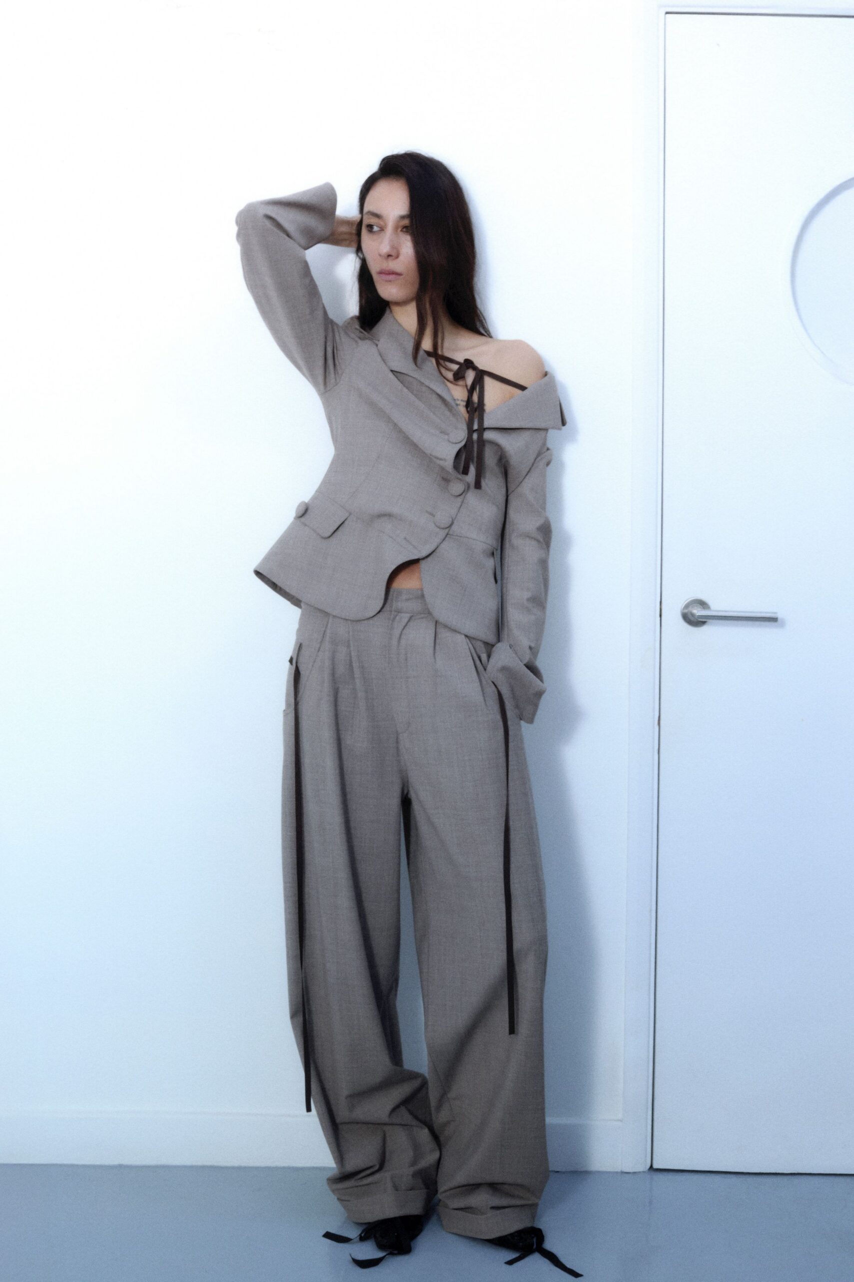 beige fitted blazer with relaxed pants