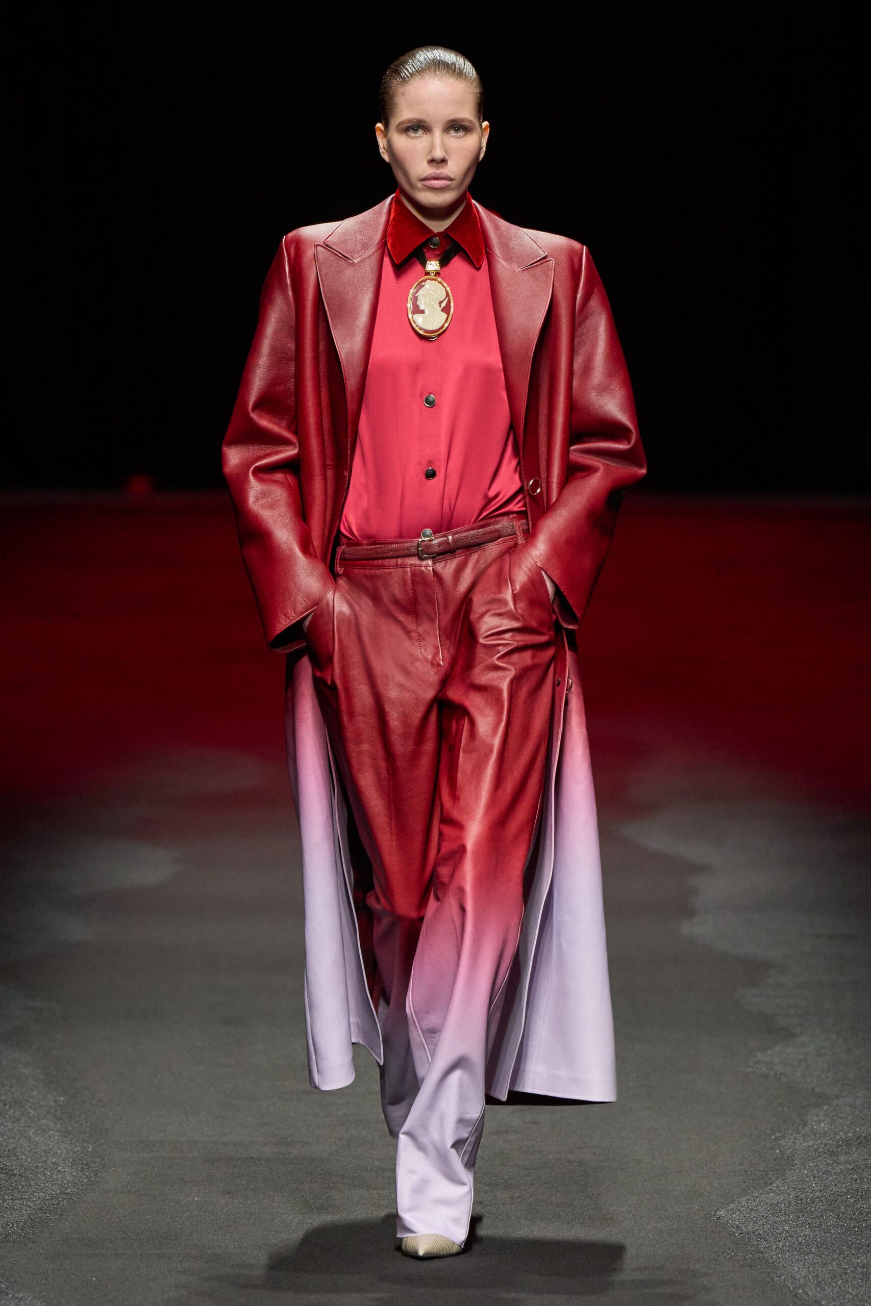 red leather long-sleeve collared fitted layered coat