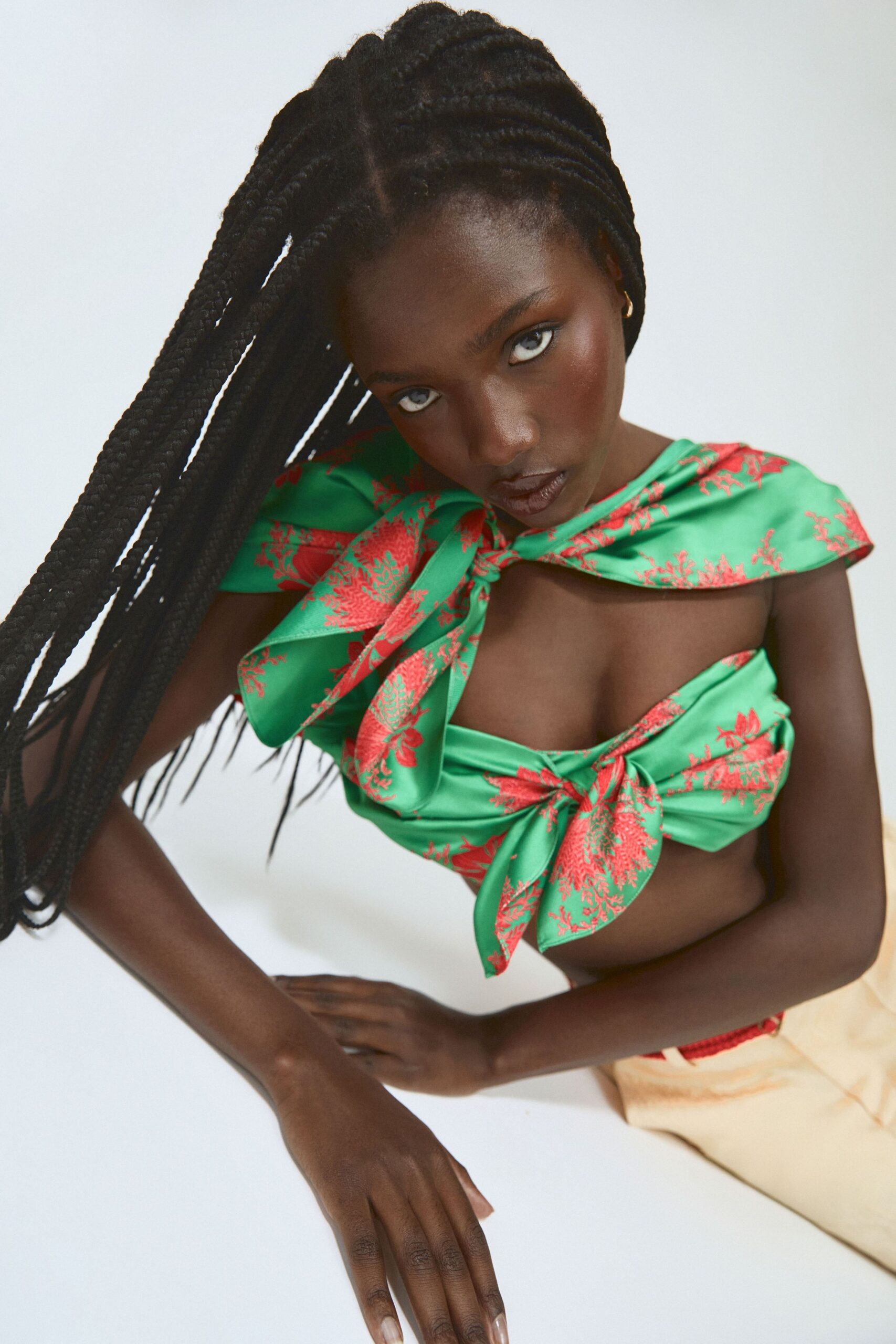 green silk sleeveless fitted ruffled top