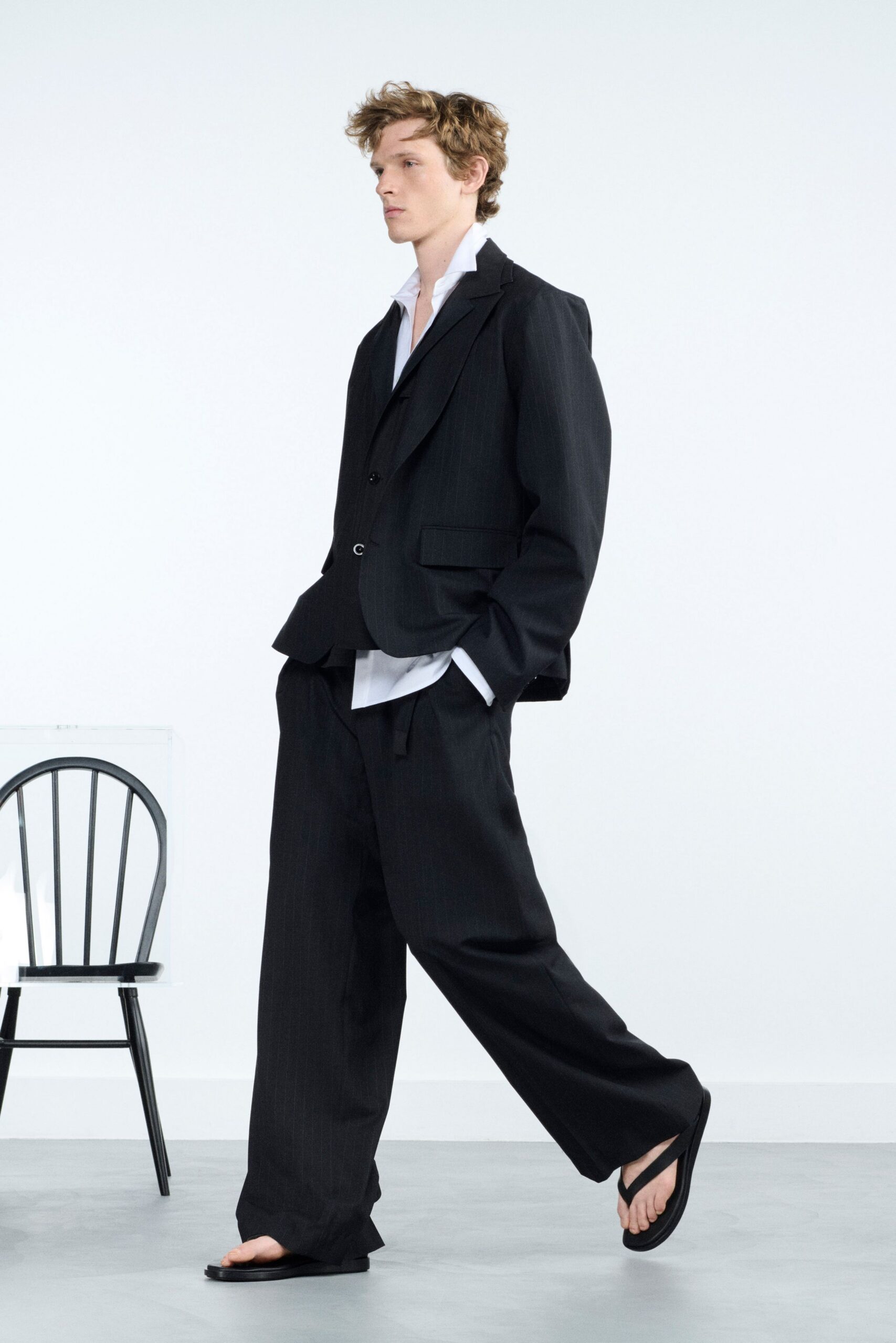 black tailored suit with white shirt
