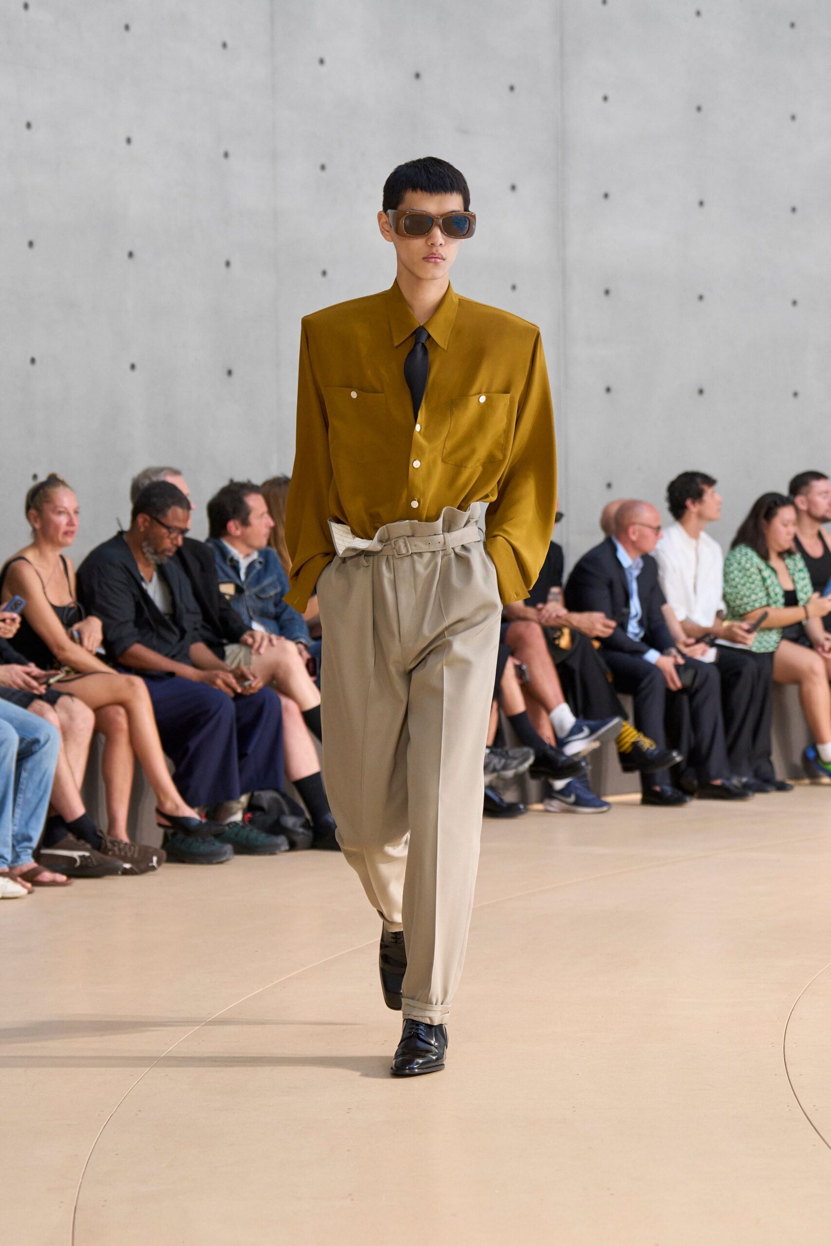 gold relaxed shirt beige pants