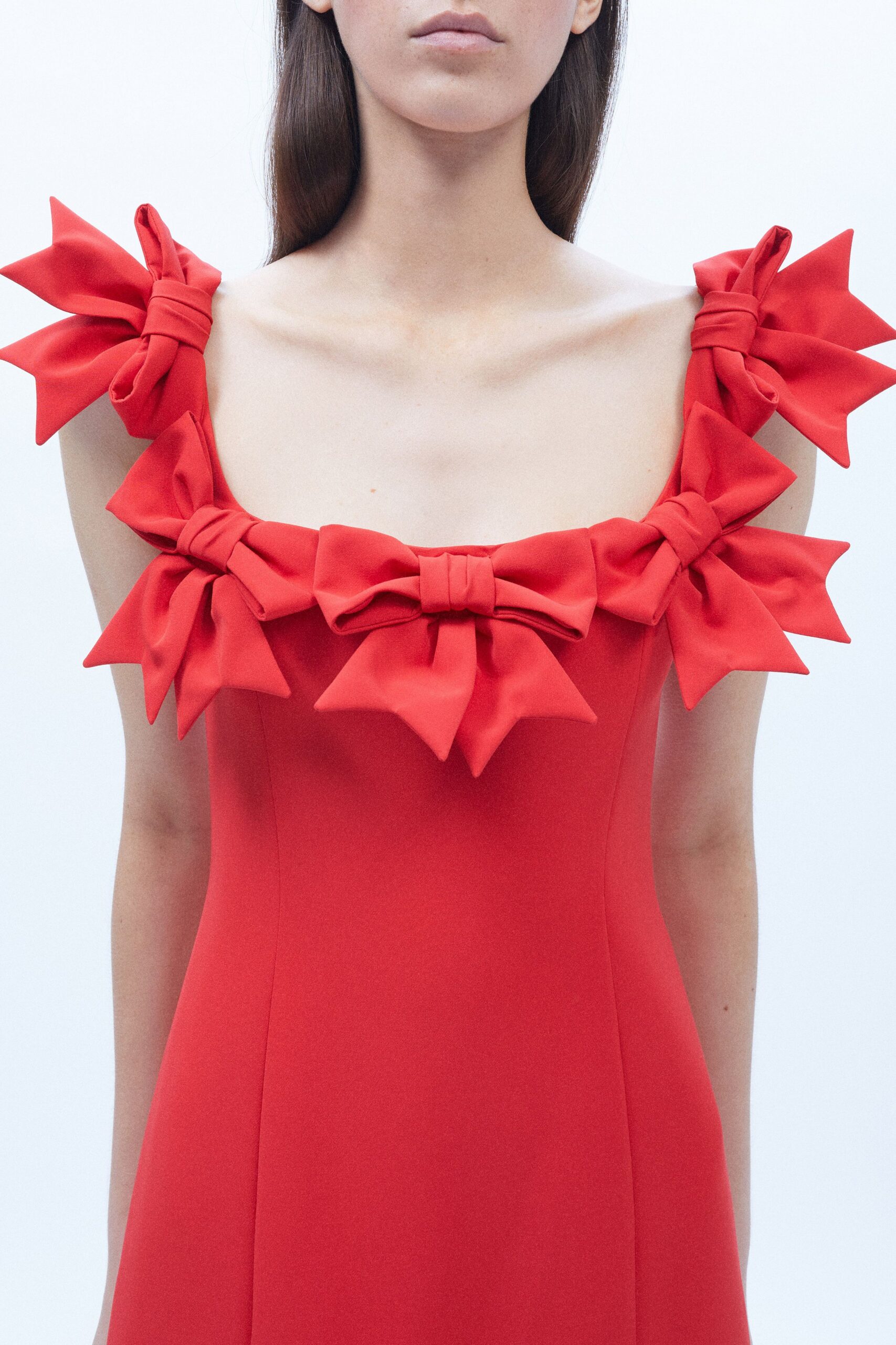 fitted red dress with bows