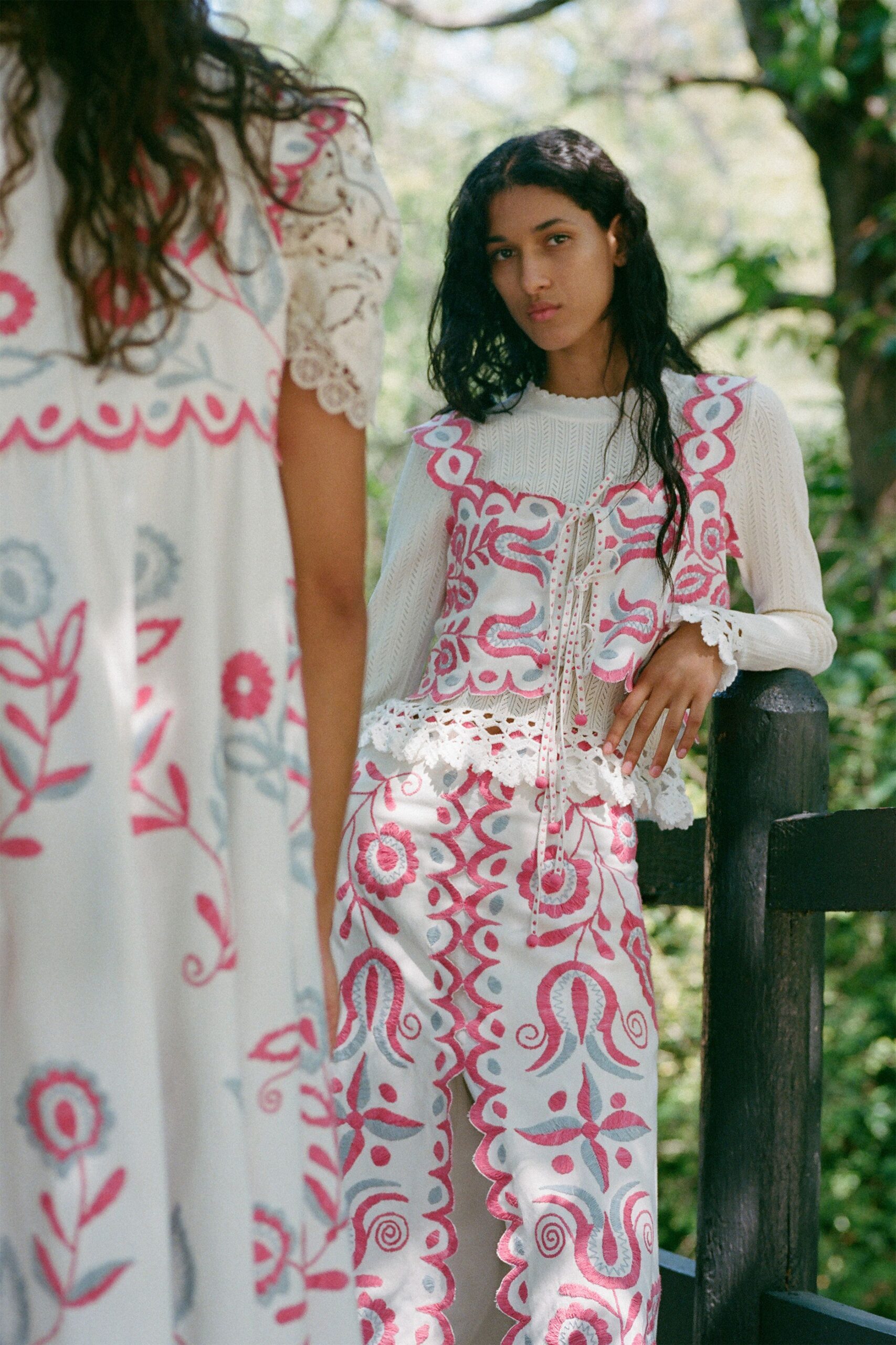 white cotton sleeveless v-neck fitted embroidered tiered dress