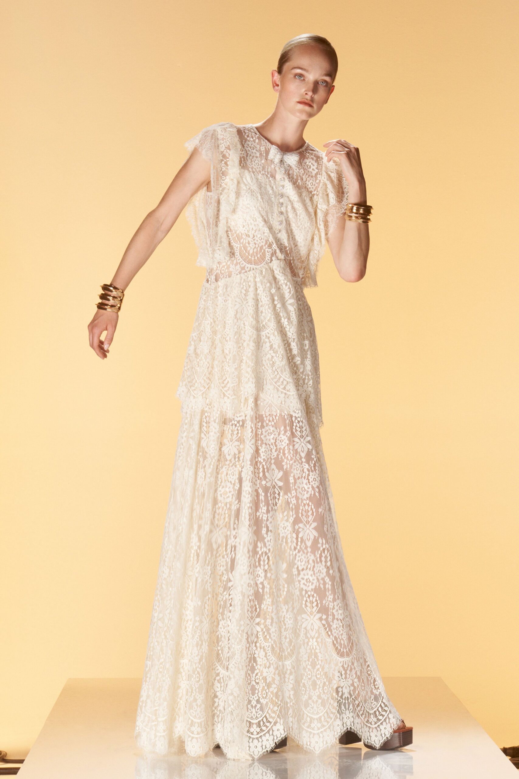 white lace sleeveless gown
