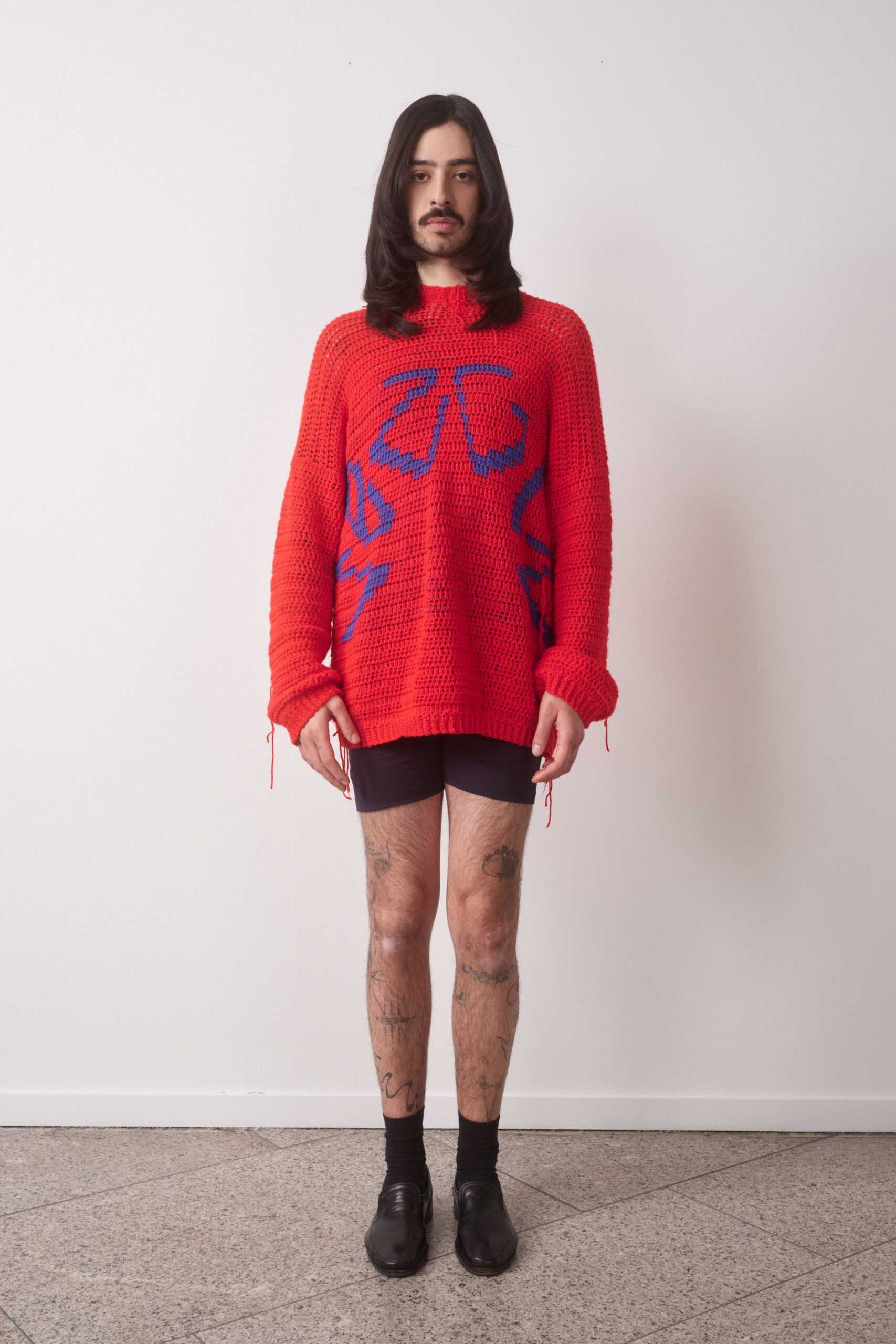 red cotton long-sleeve high-neck relaxed embroidered sweater
