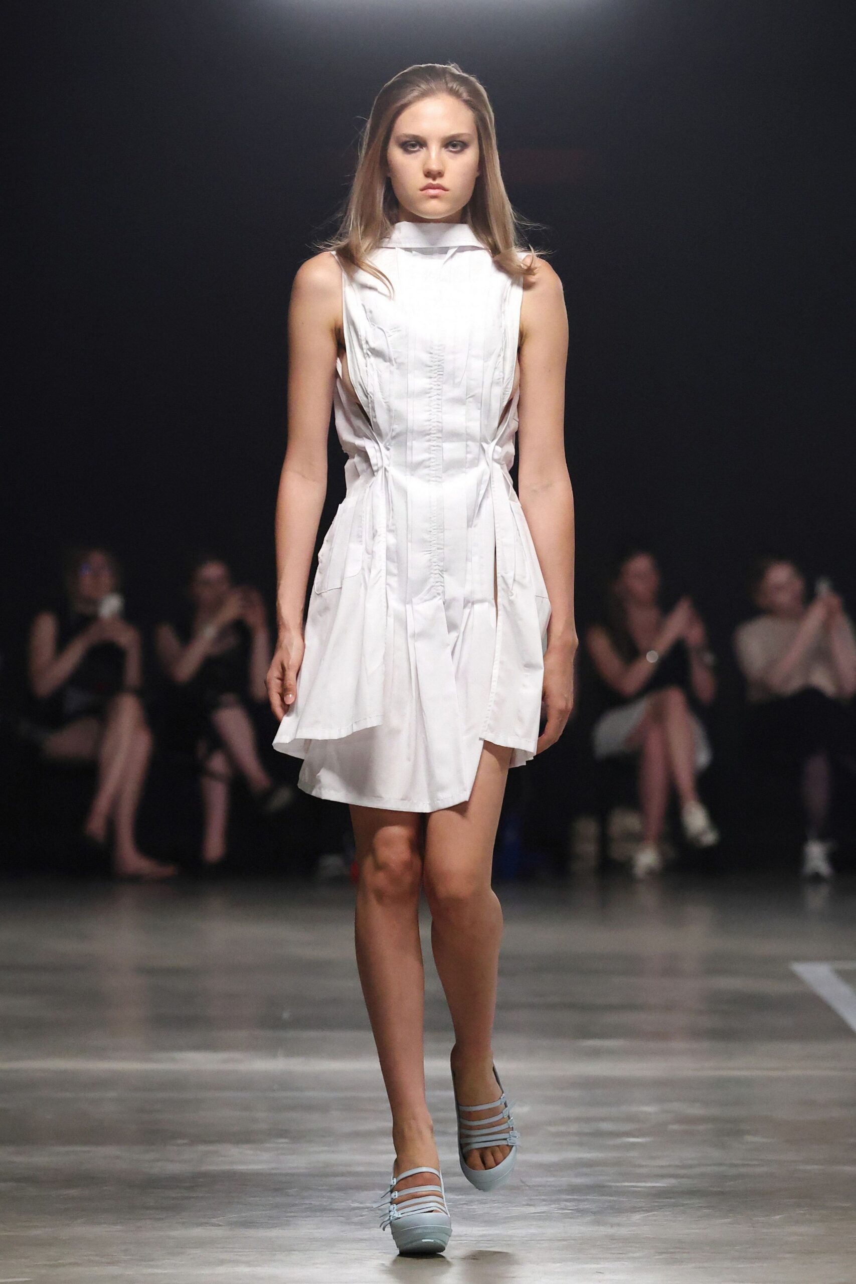 white pleated mini dress with blue shoes