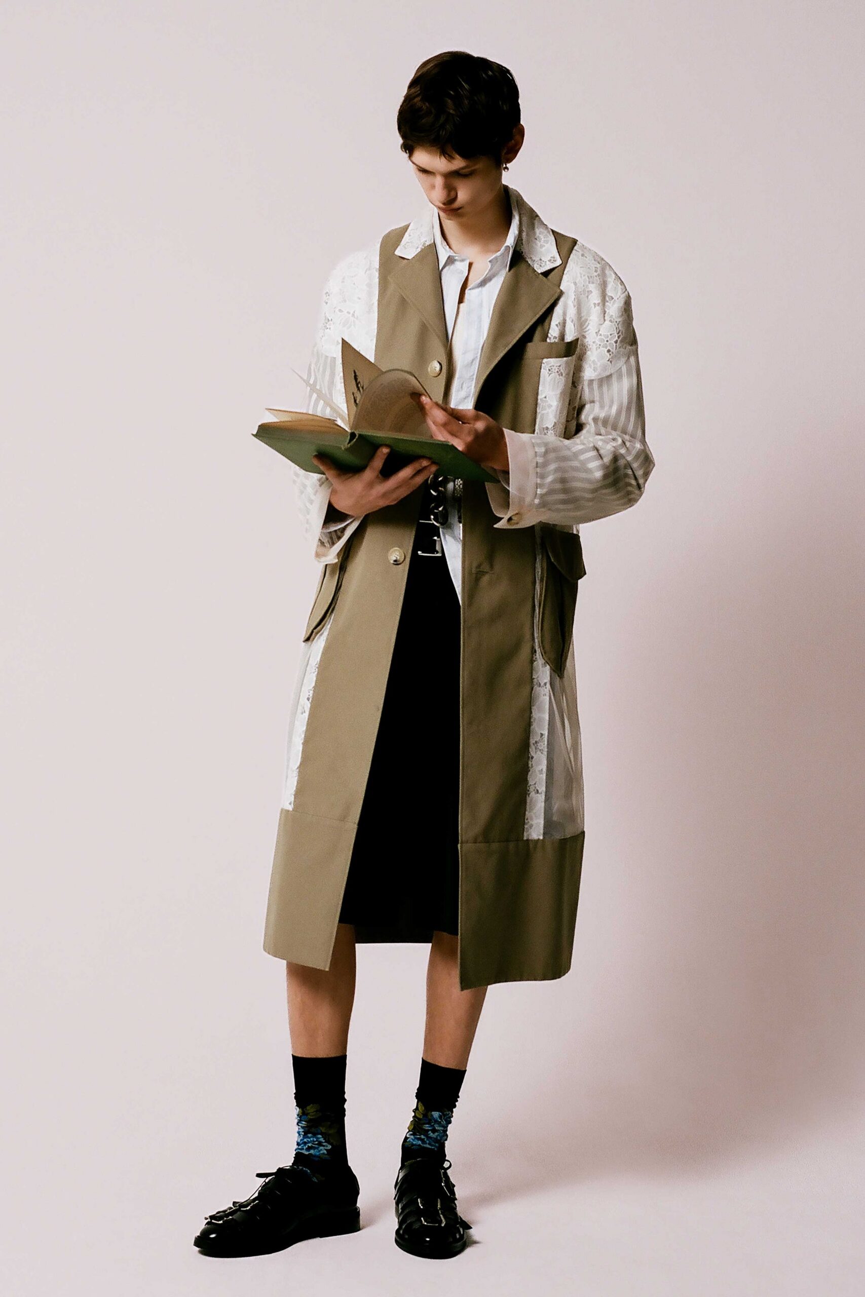 beige coat with black skirt