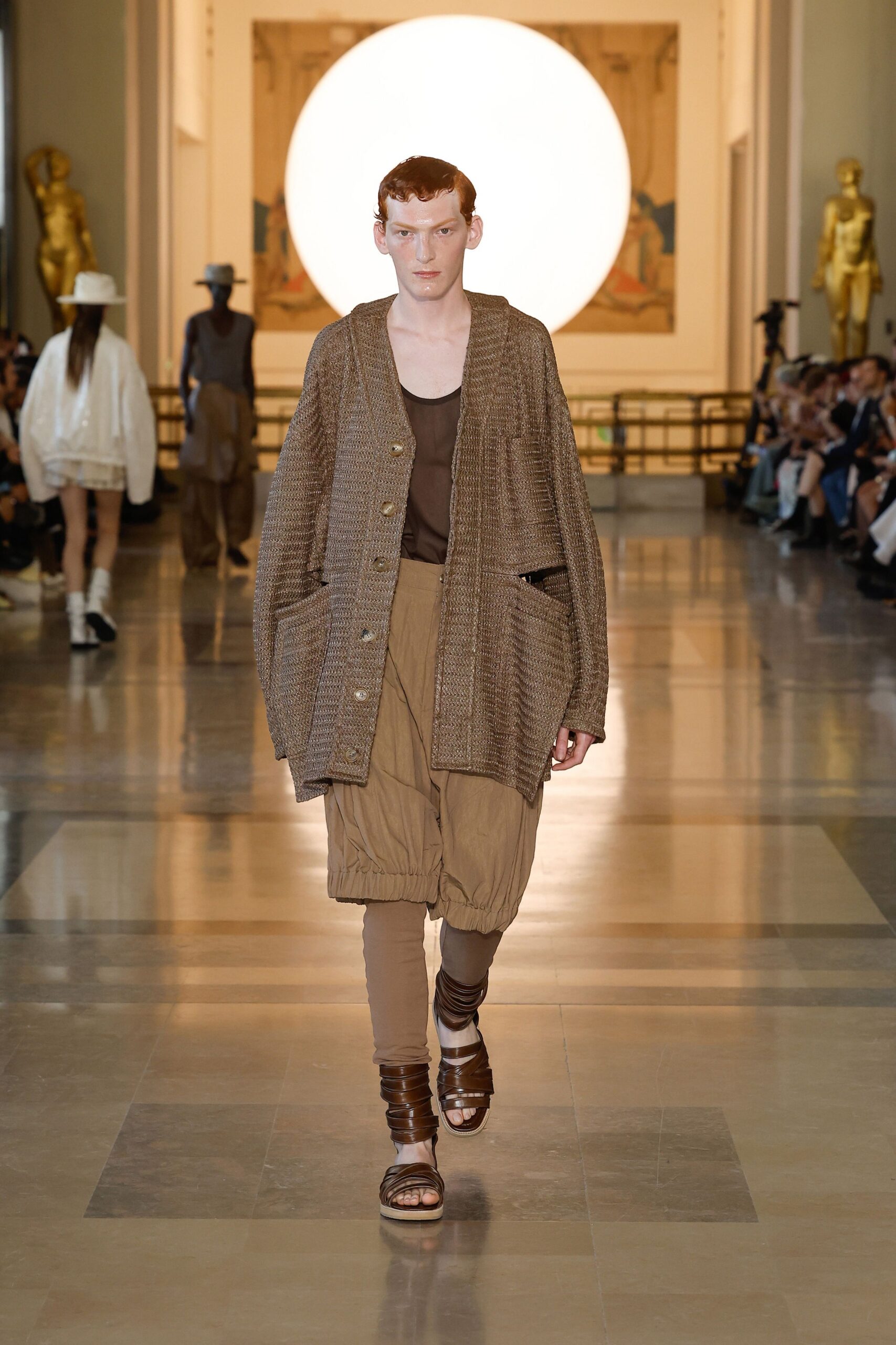 brown relaxed cardigan with beige pants