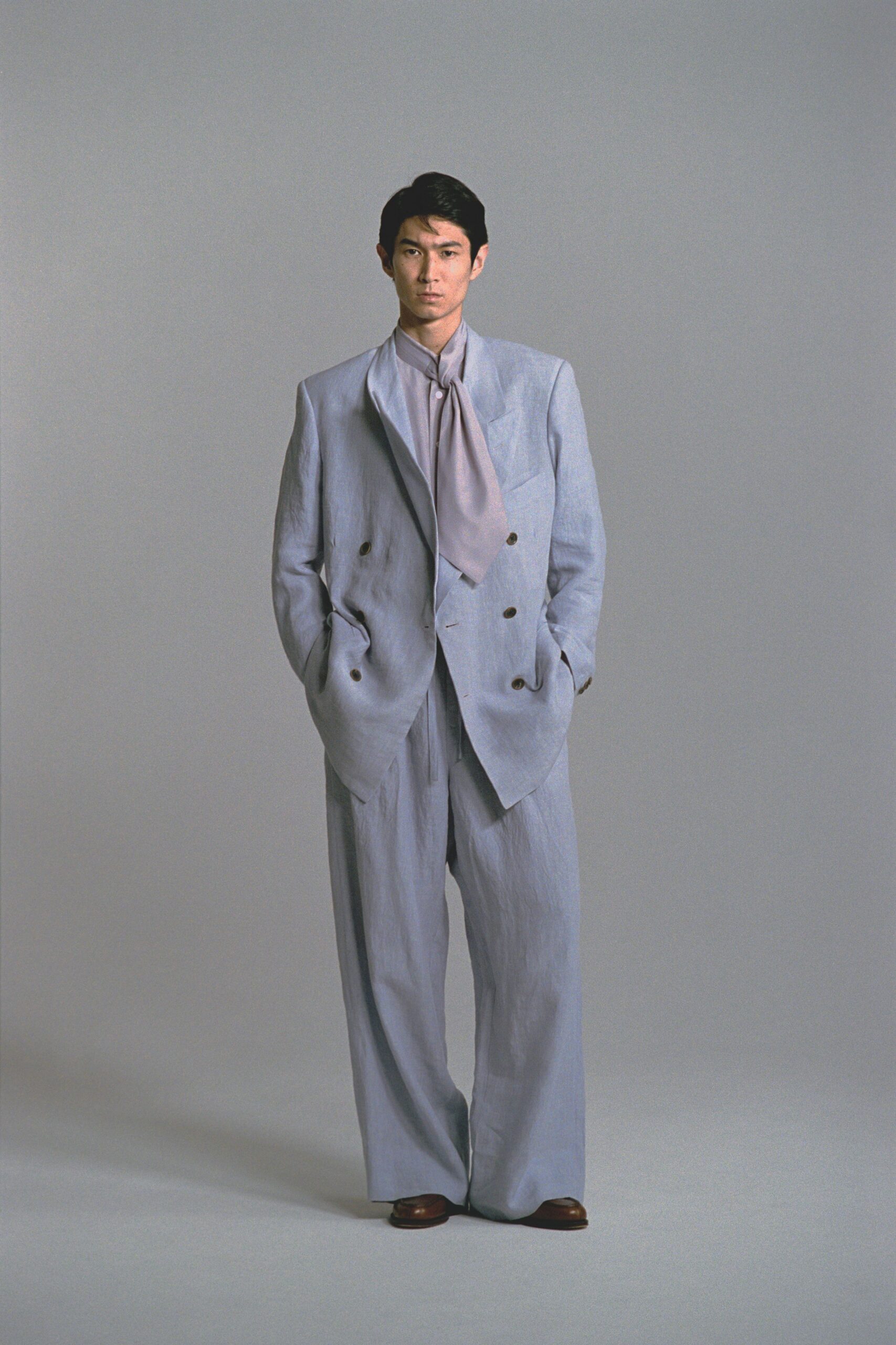 light gray linen suit with silk shirt