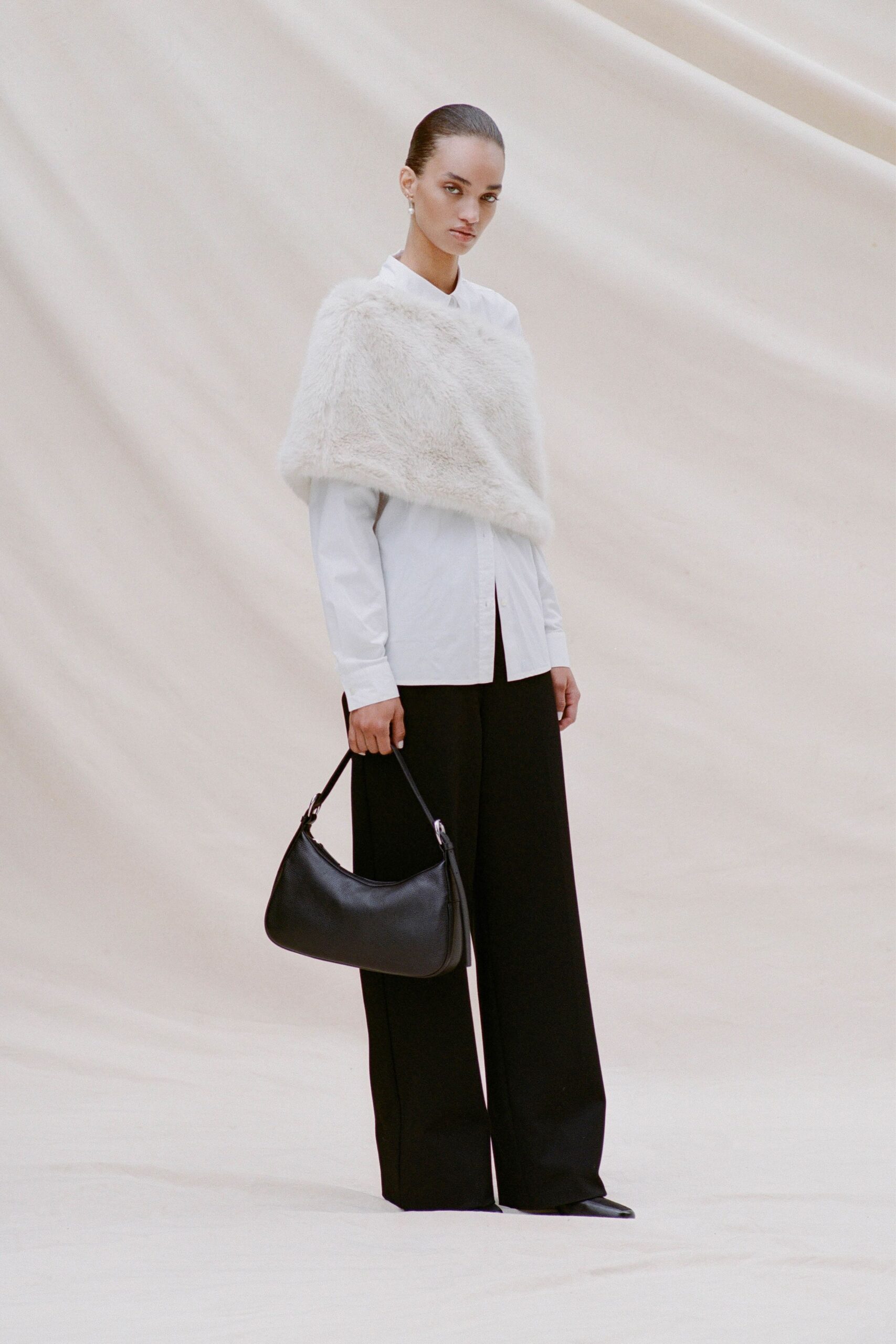 white faux-fur oversized cape