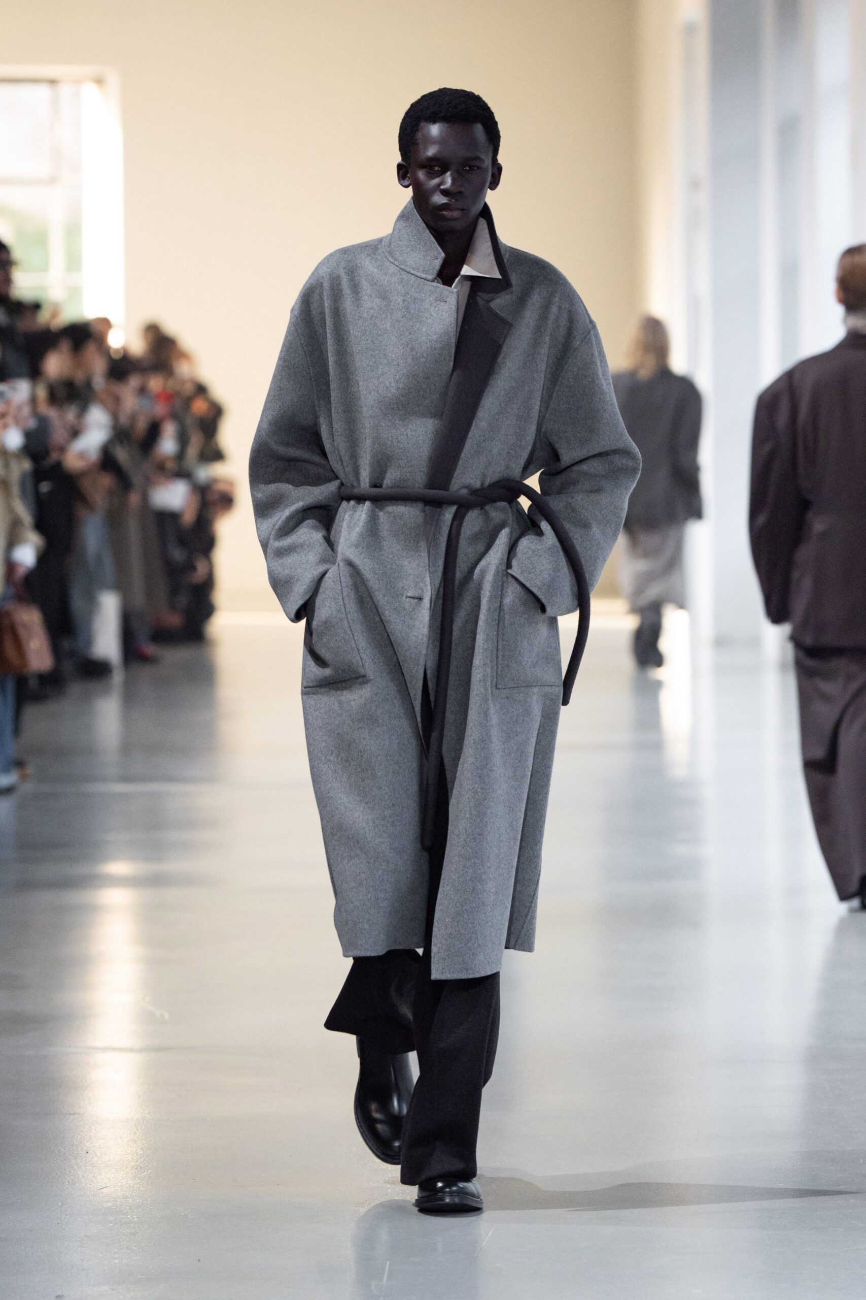 gray wool coat with black pants