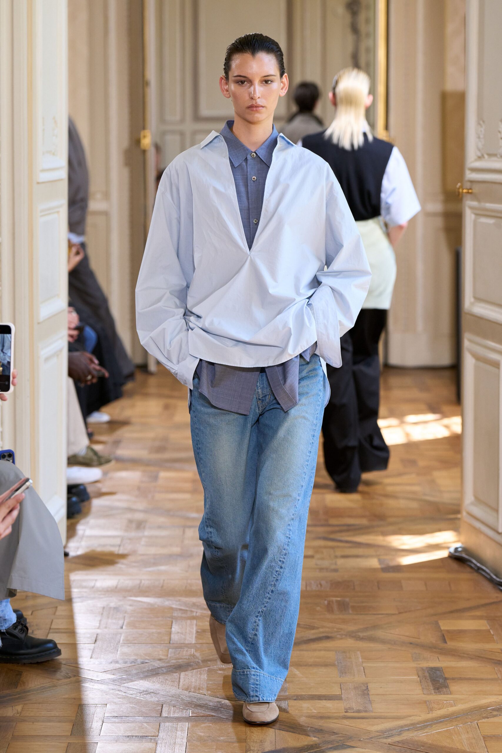 light blue relaxed top with wide-leg jeans