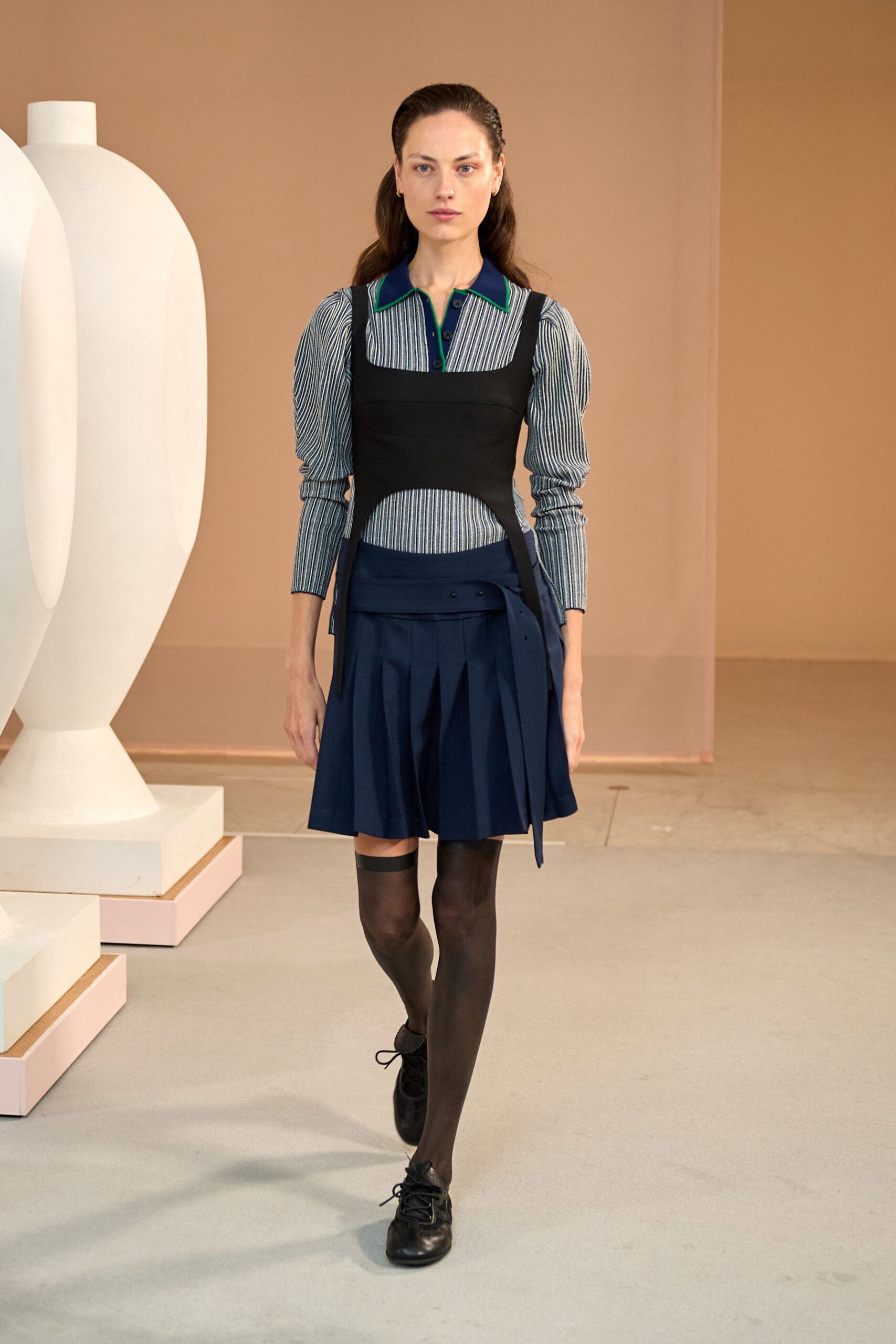 blue striped shirt black pleated dress