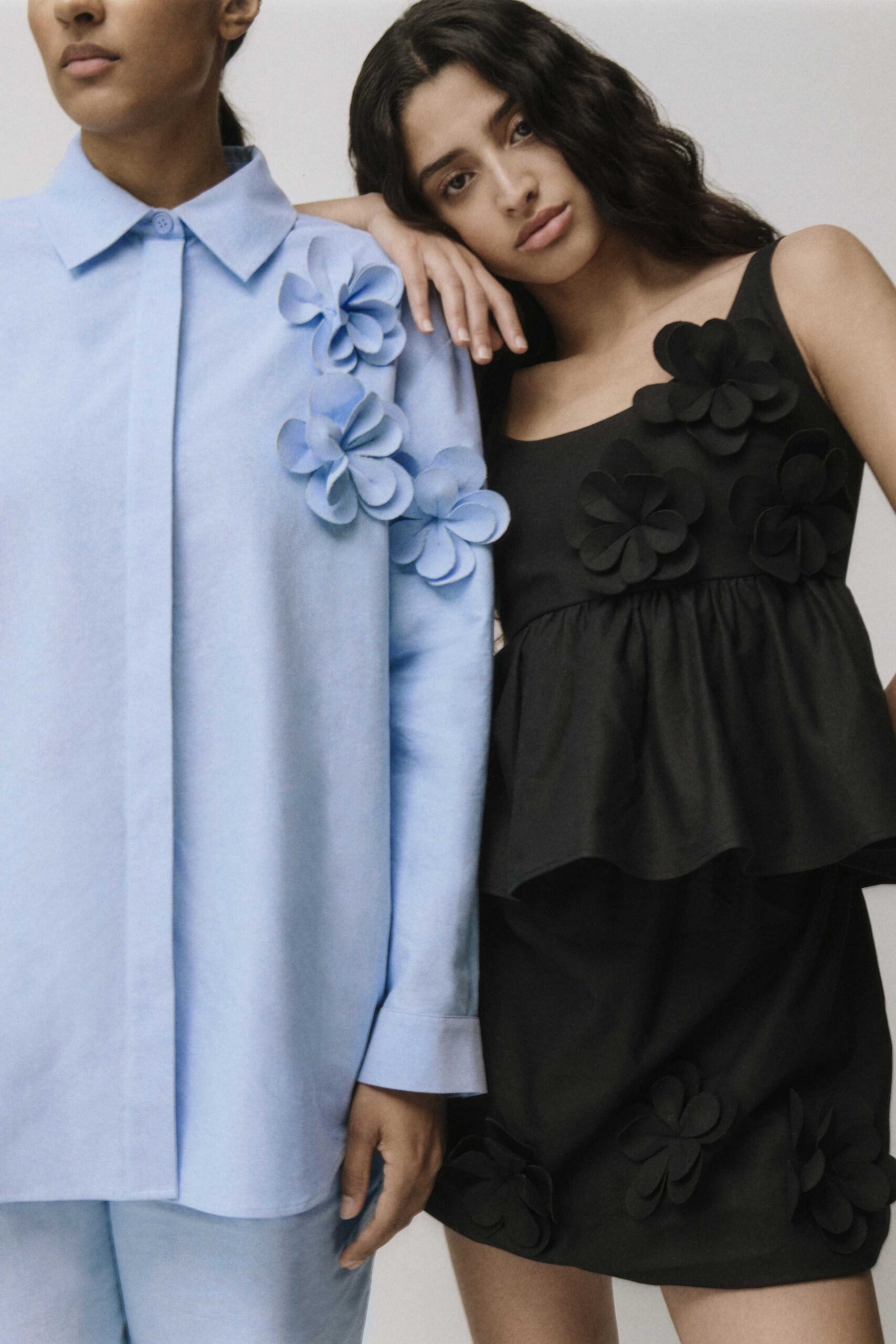 blue shirt and black dress