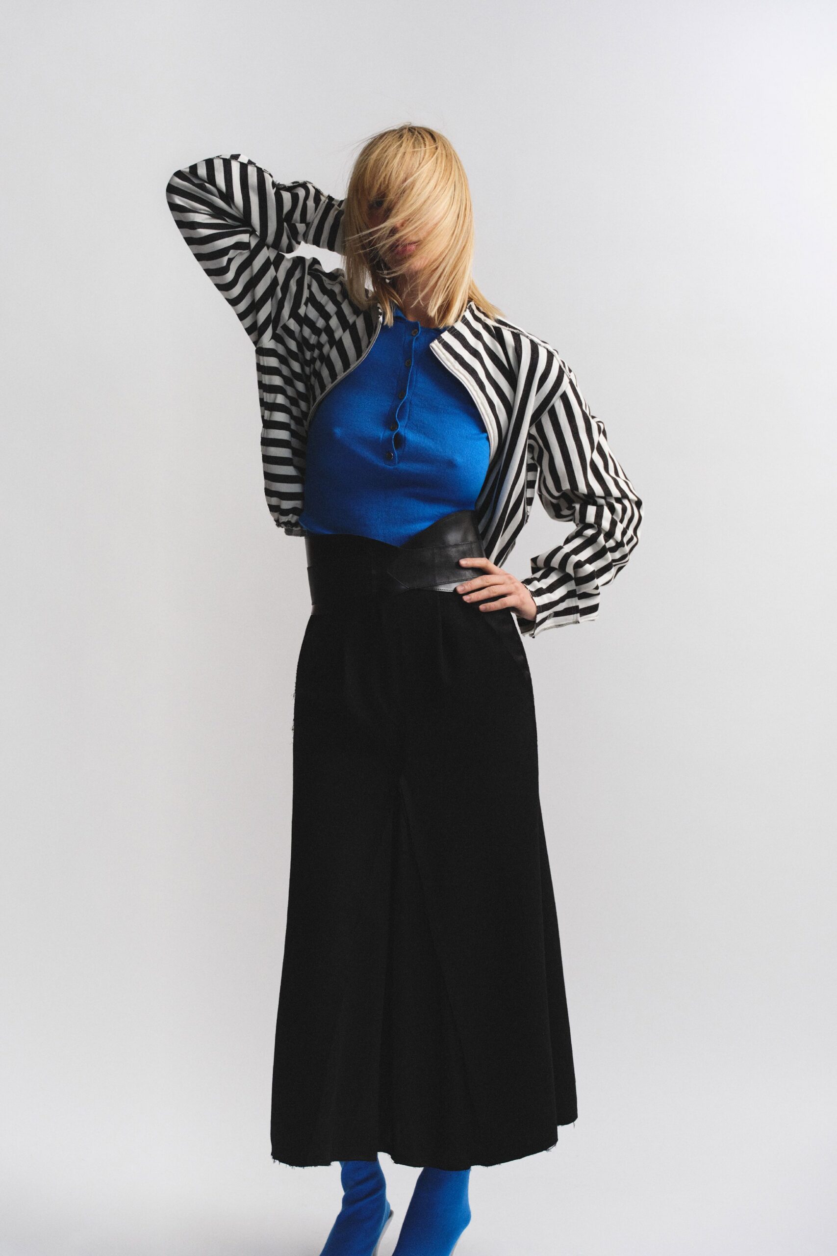 striped jacket blue top black pants
