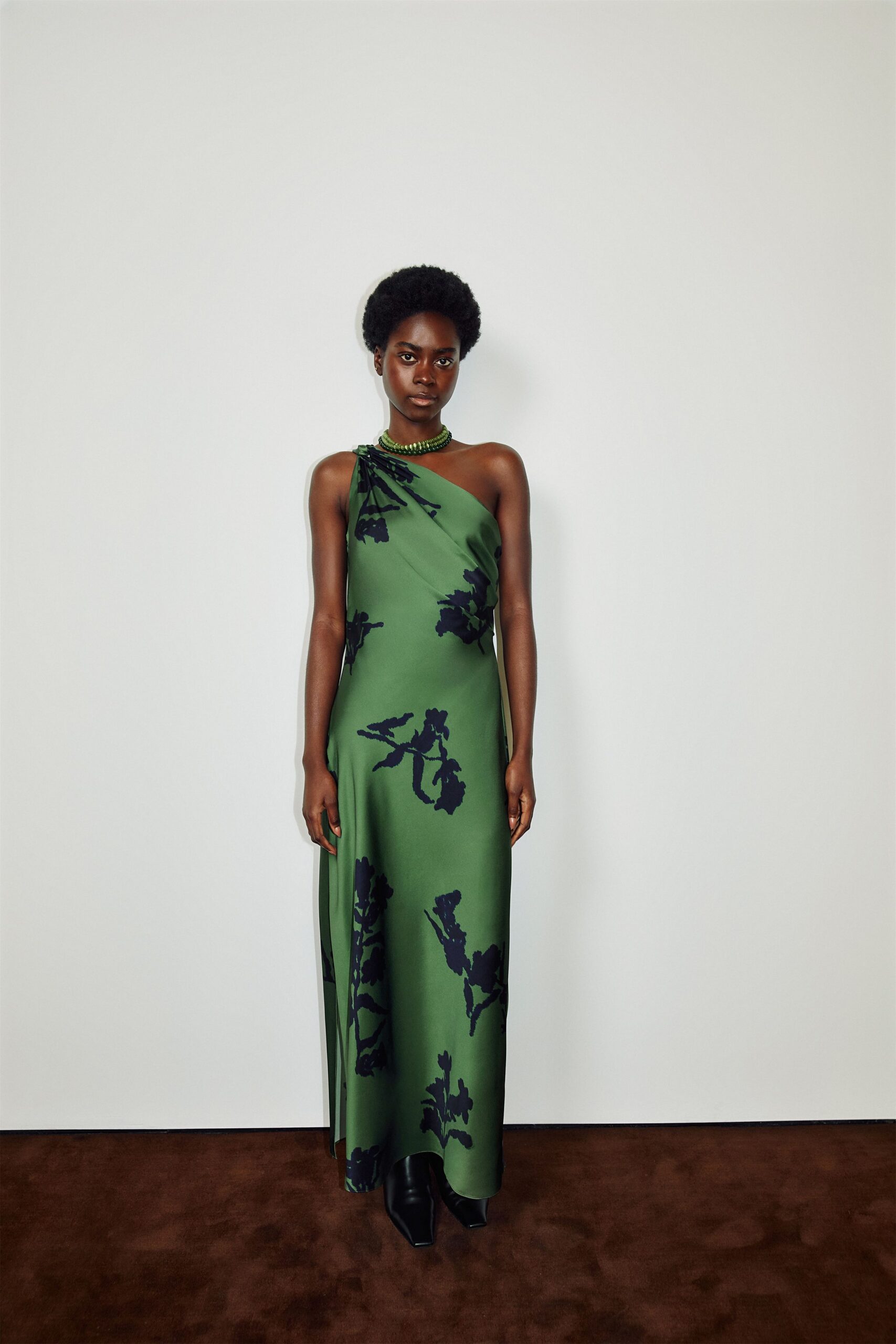 green silk sleeveless high-neck fitted floral draped gown