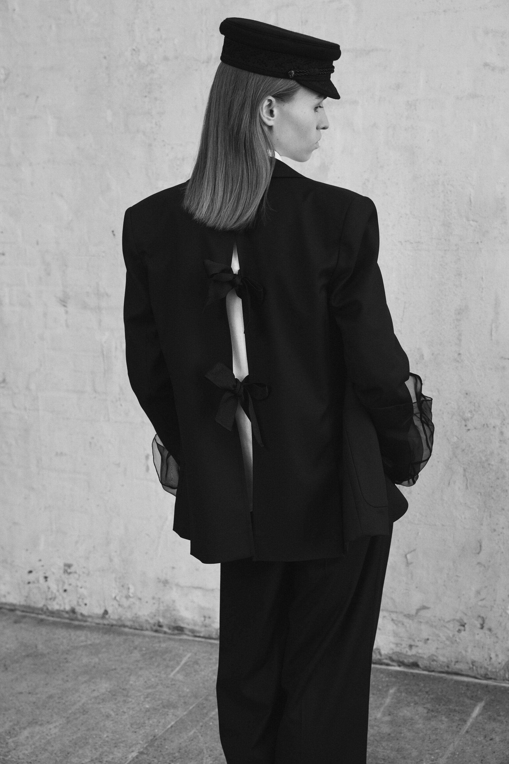 black cotton long-sleeve collared tailored buttoned draped blazer