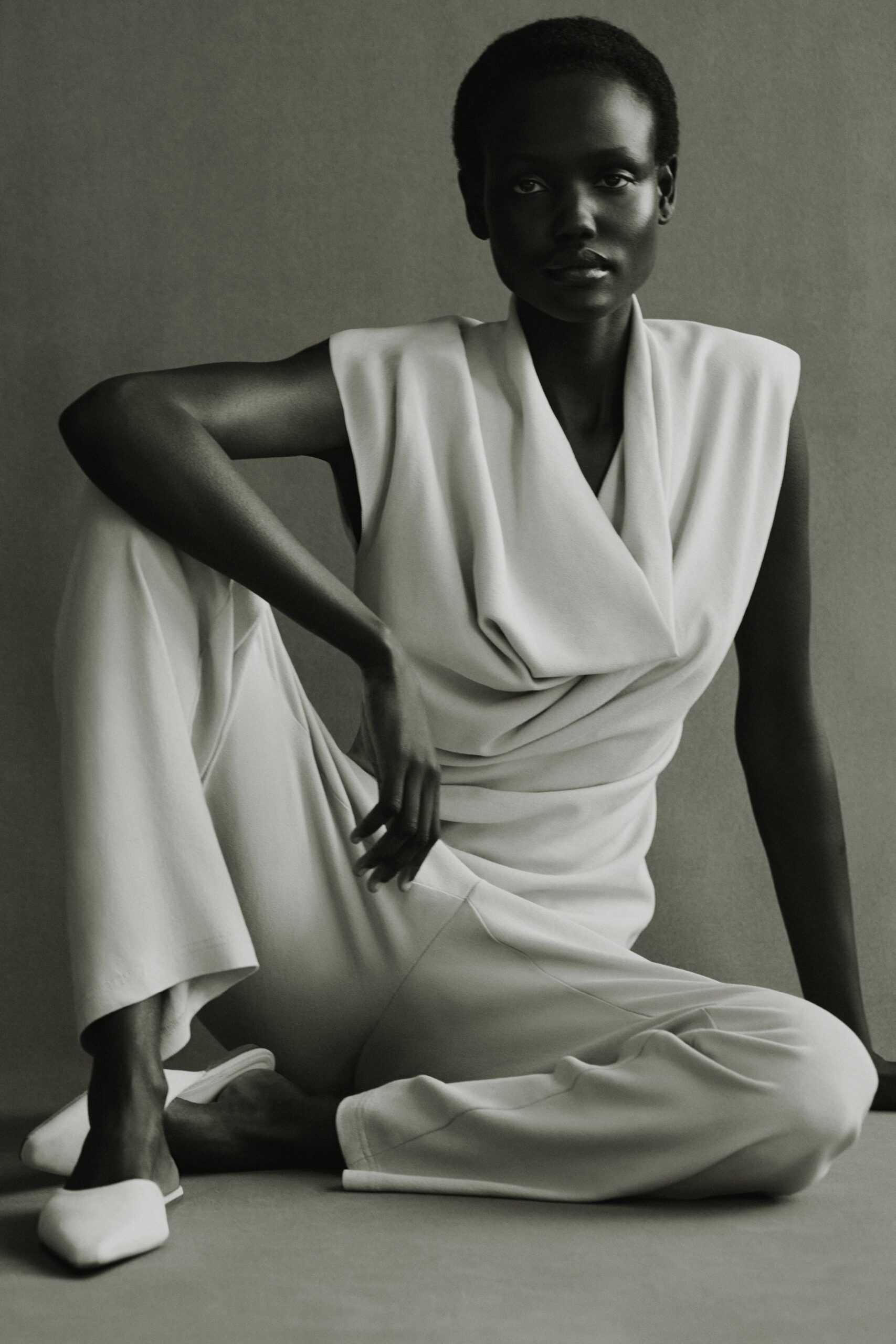 white fitted jumpsuit with shoes