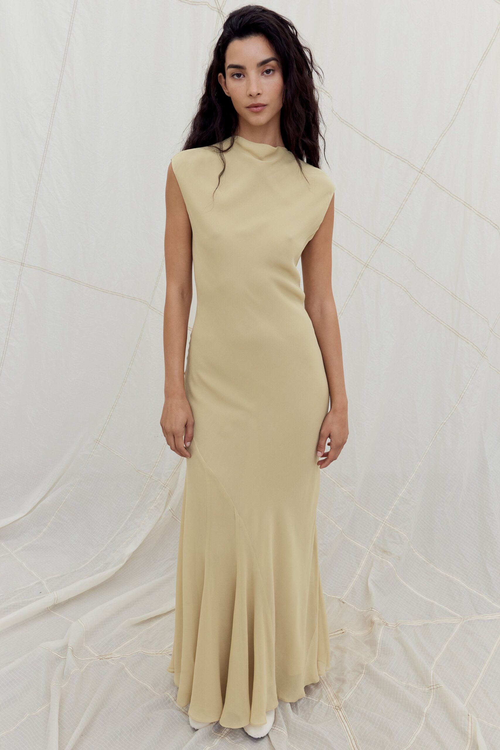 beige fitted sleeveless gown